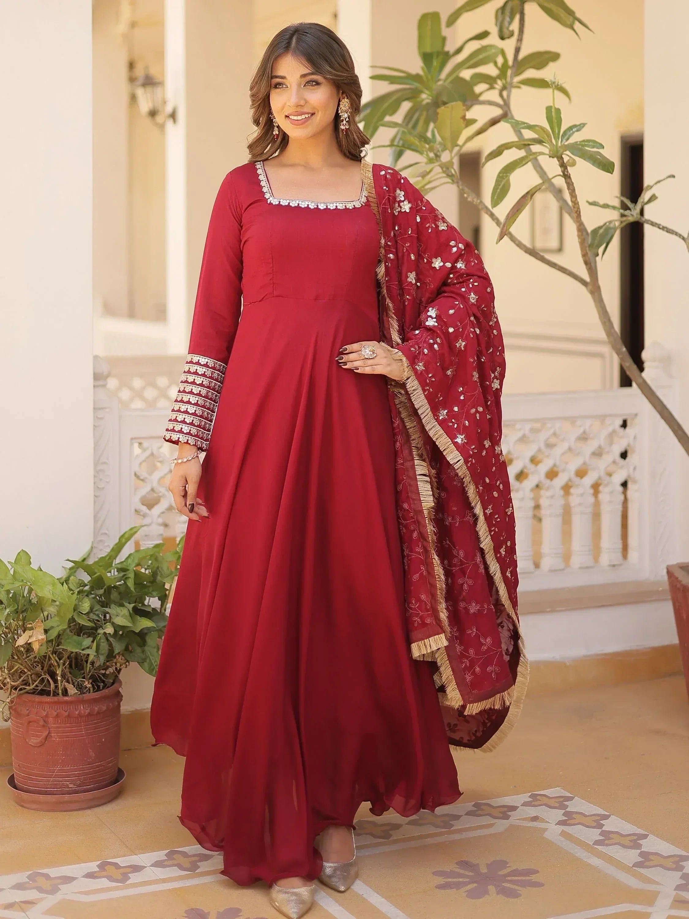 Maroon ethnic anarkali gown with embroidered dupatta, perfect for Indian festive occasions and weddings