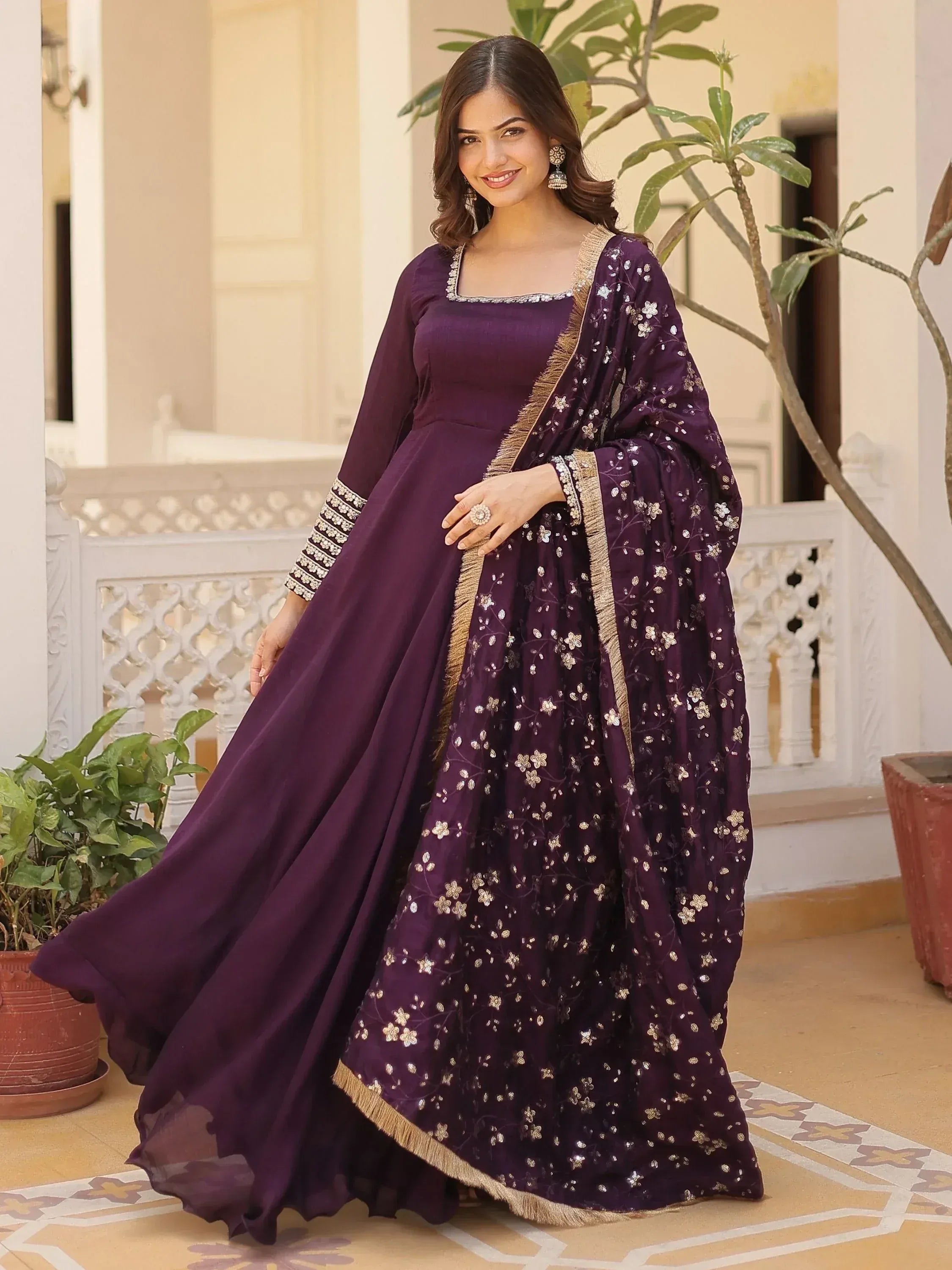 Elegant purple anarkali with gold floral embroidery and dupatta, perfect for Indian ethnic occasions