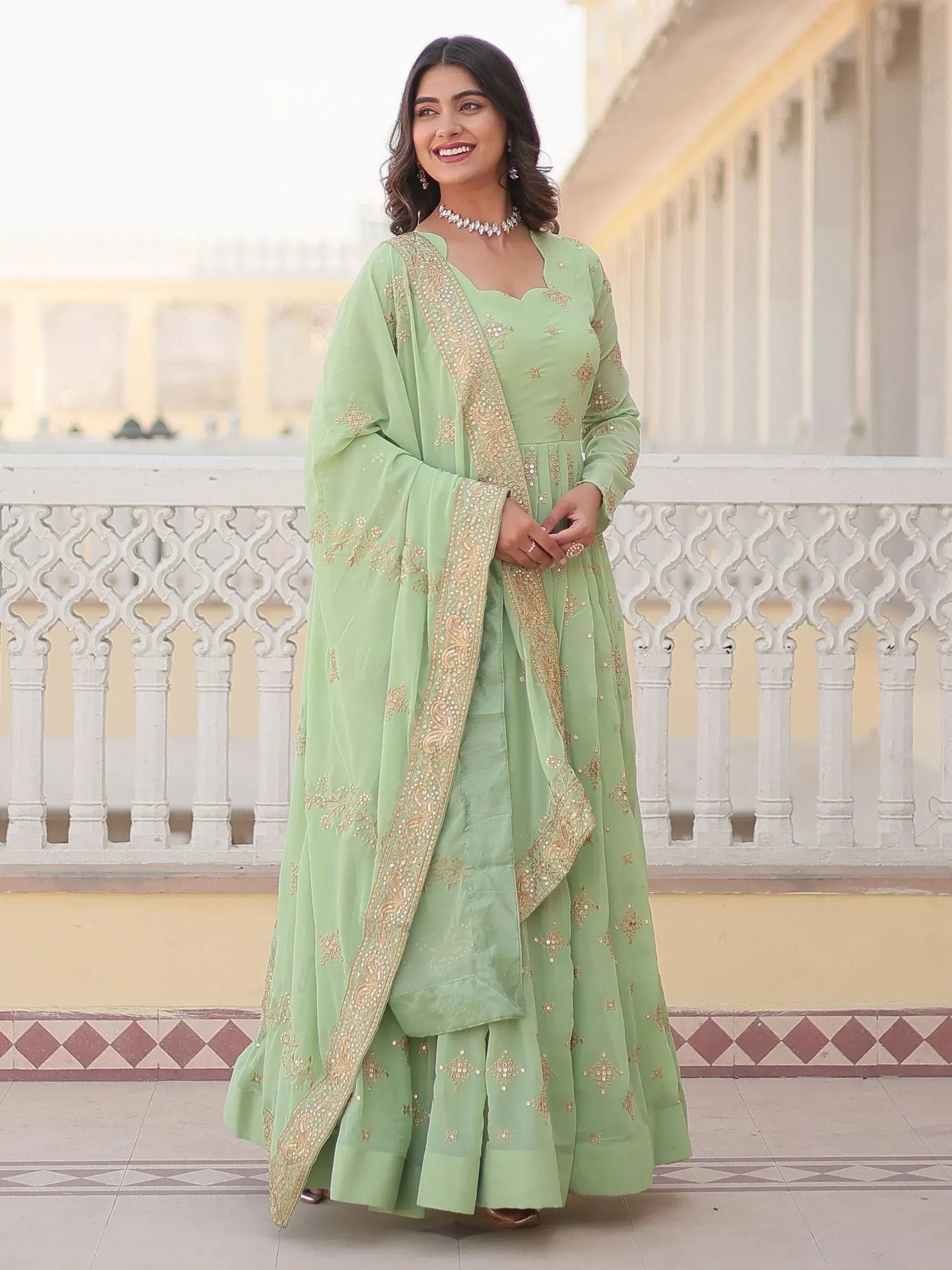 Mint green embroidered anarkali suit with gold detailing, perfect for Indian ethnic wear occasions