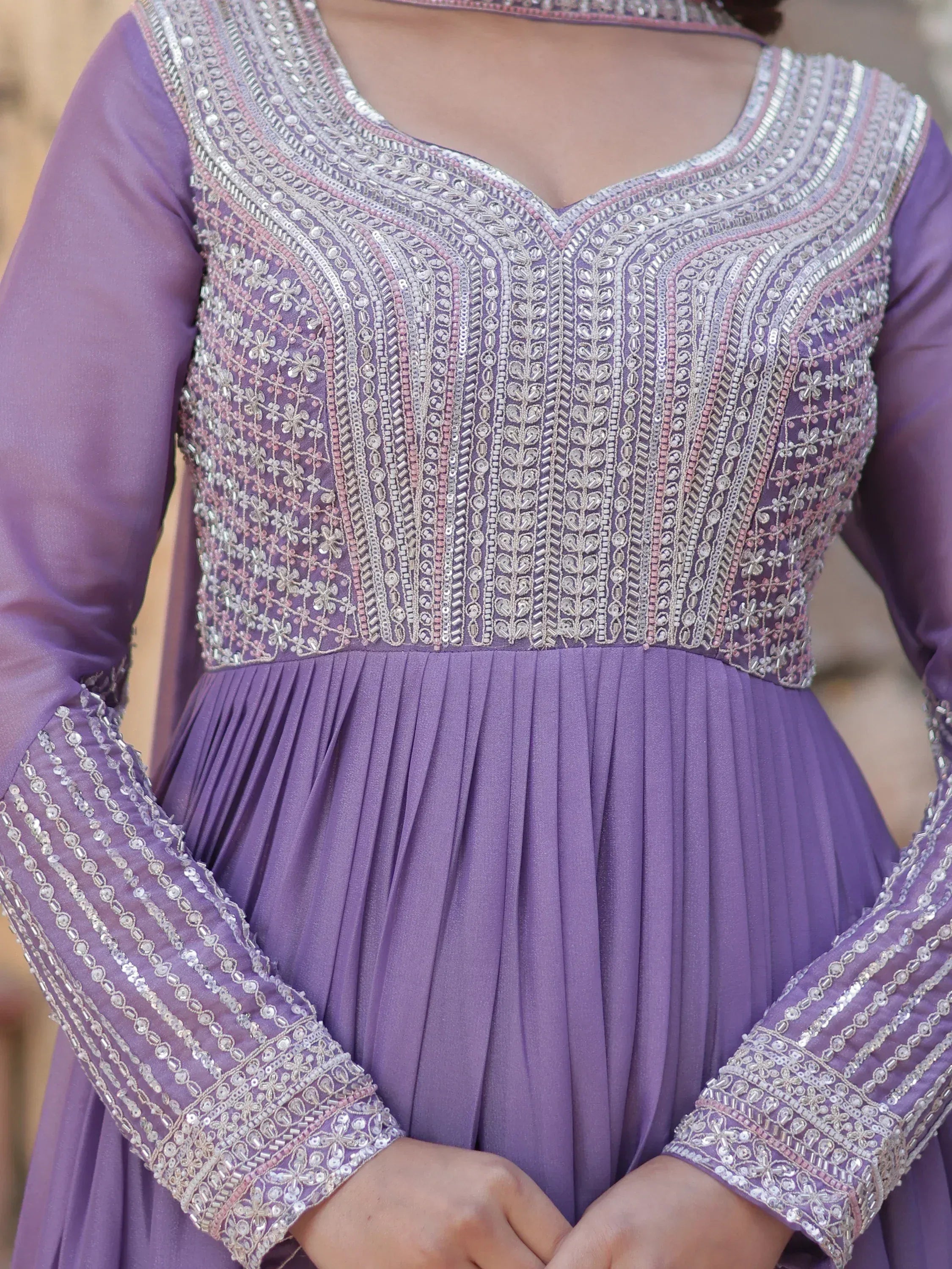 Purple ethnic gown with intricate silver embroidery and pleated design