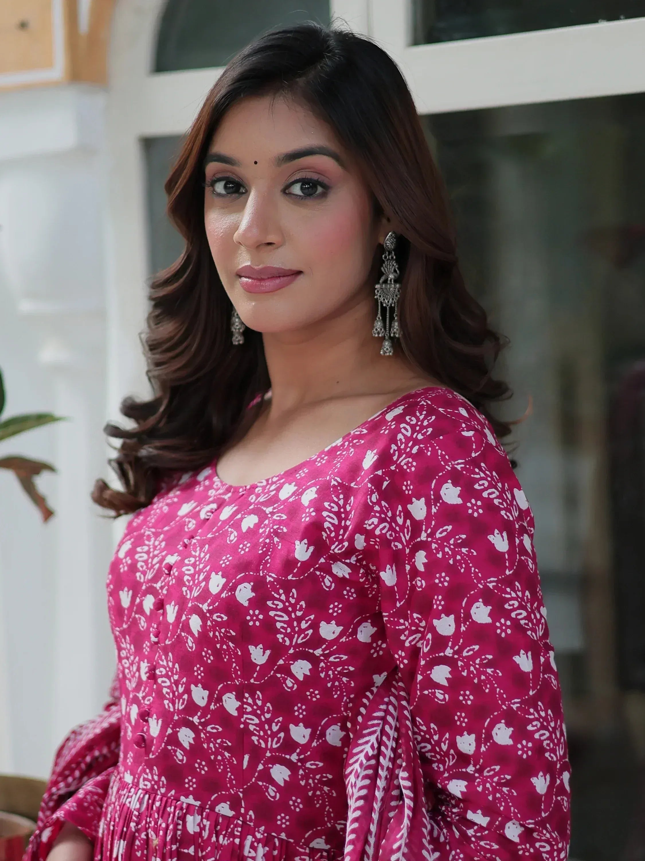 Pink floral print ethnic kurta with bell sleeves, perfect for Indian occasions