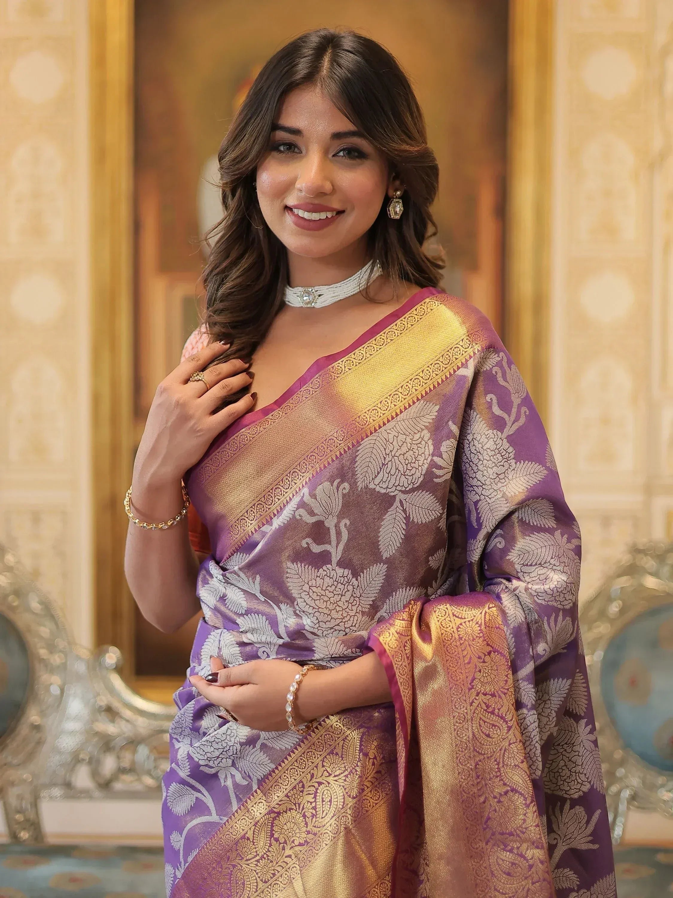 Purple and gold floral designer saree with intricate woven patterns, perfect for Indian ethnic wear occasions