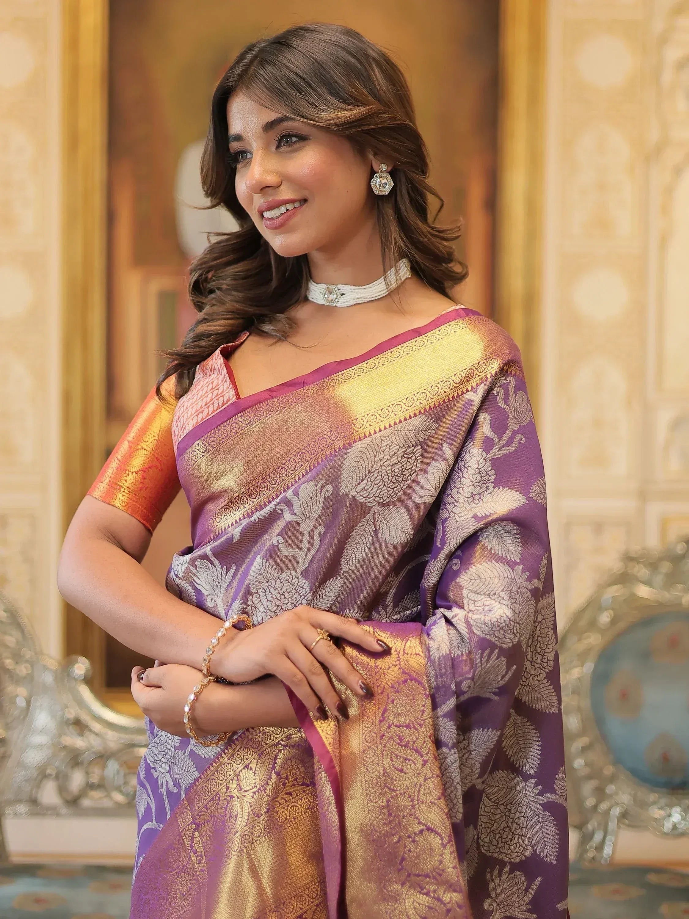 Elegant purple and gold floral saree with designer blouse, perfect for Indian ethnic wear occasions