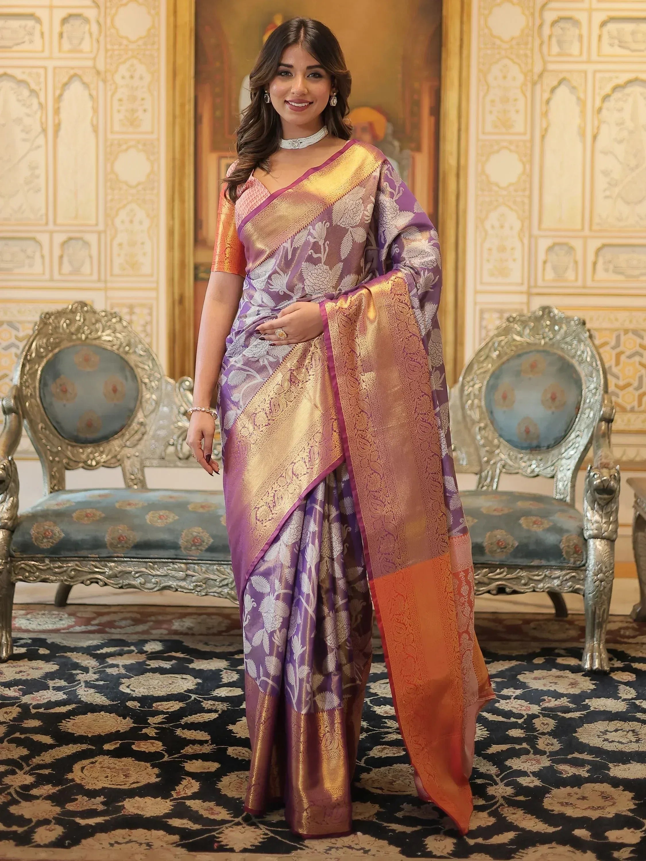 Purple and gold designer saree with floral print and zari border, perfect for Indian ethnic wear occasions.