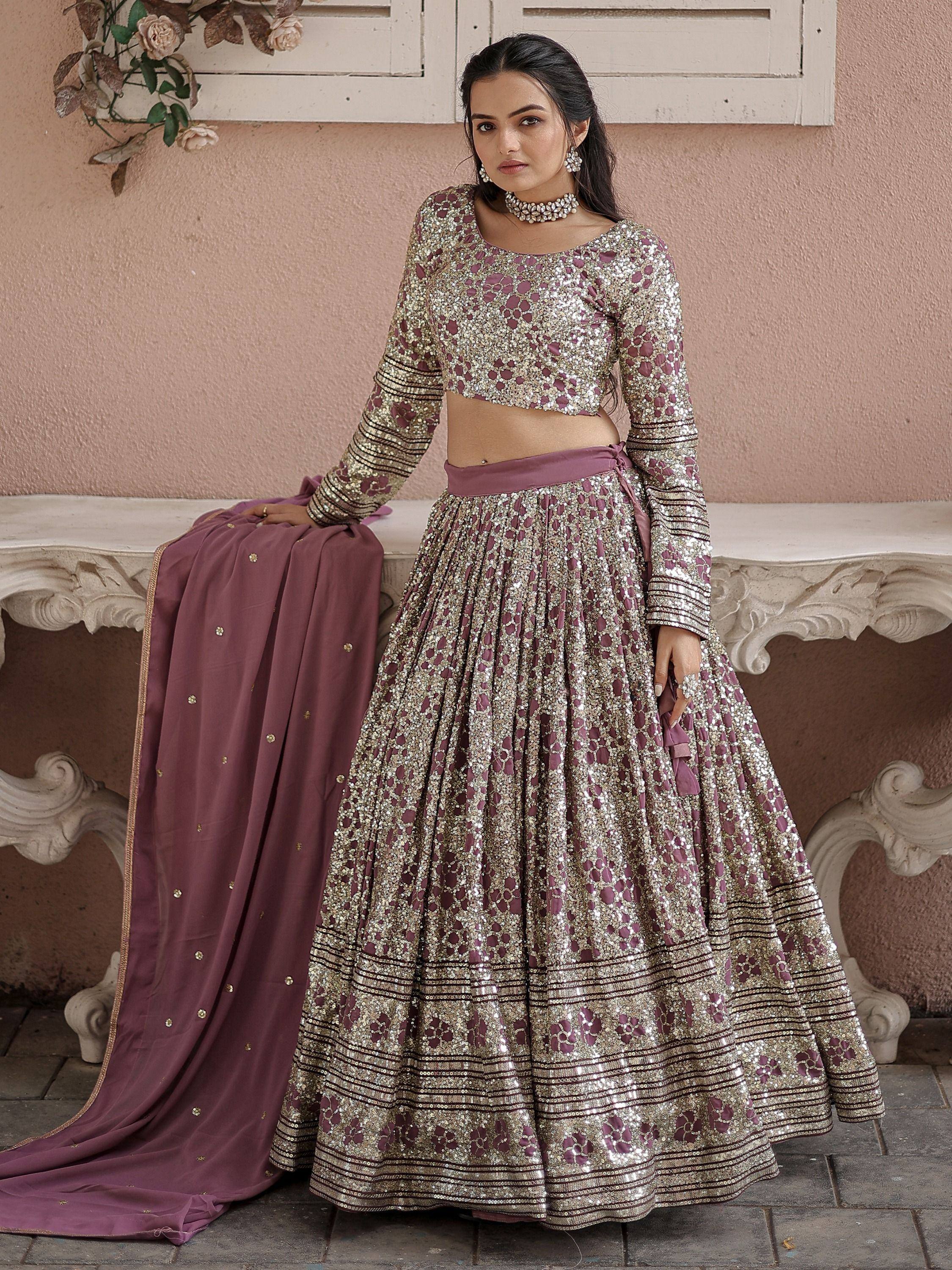Elegant mauve and gold sequin lehenga choli with matching dupatta, perfect for Indian weddings and festive occasions.