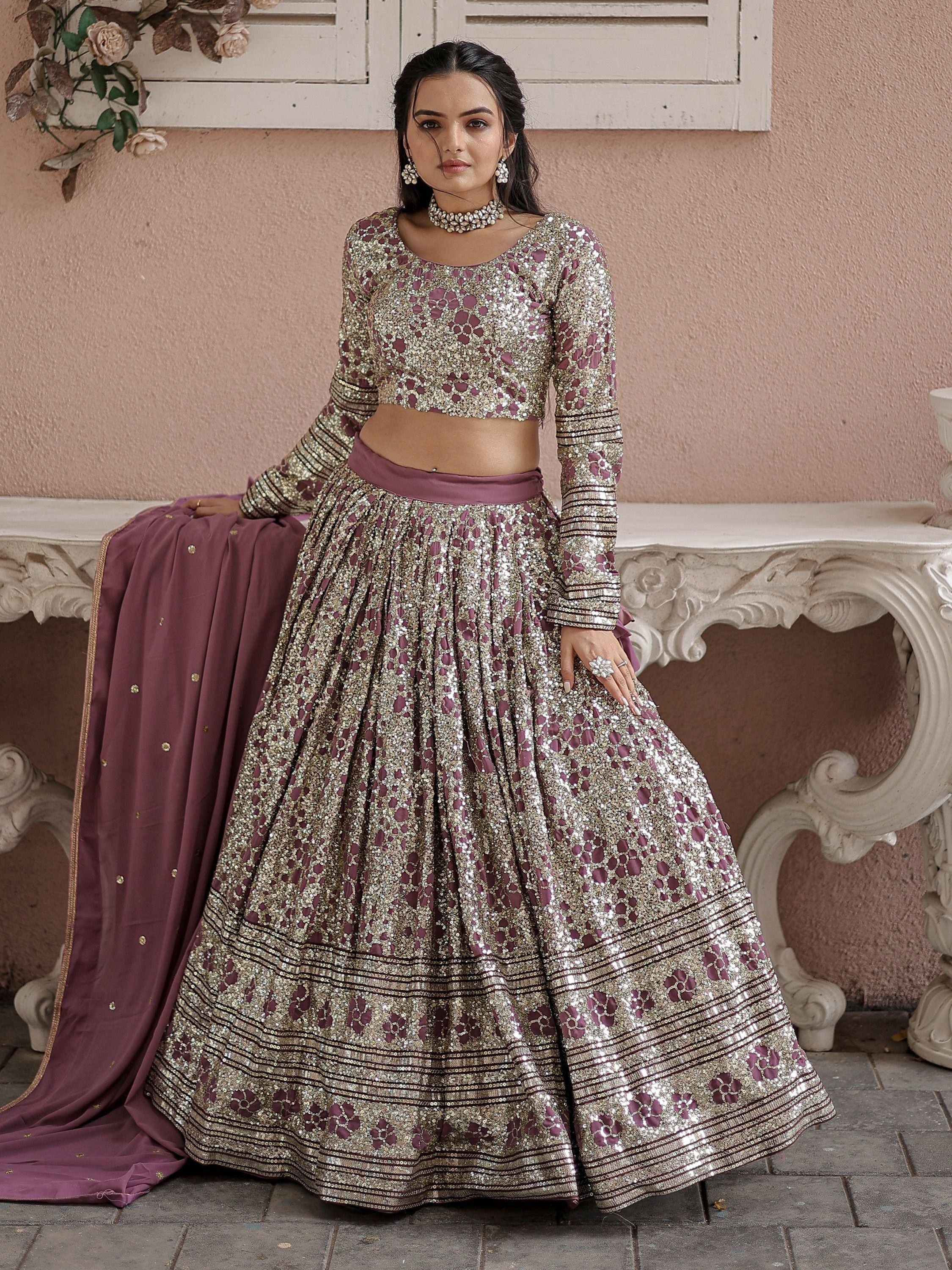 Elegant mauve and gold sequin lehenga choli with matching dupatta, perfect for Indian weddings and festive occasions.
