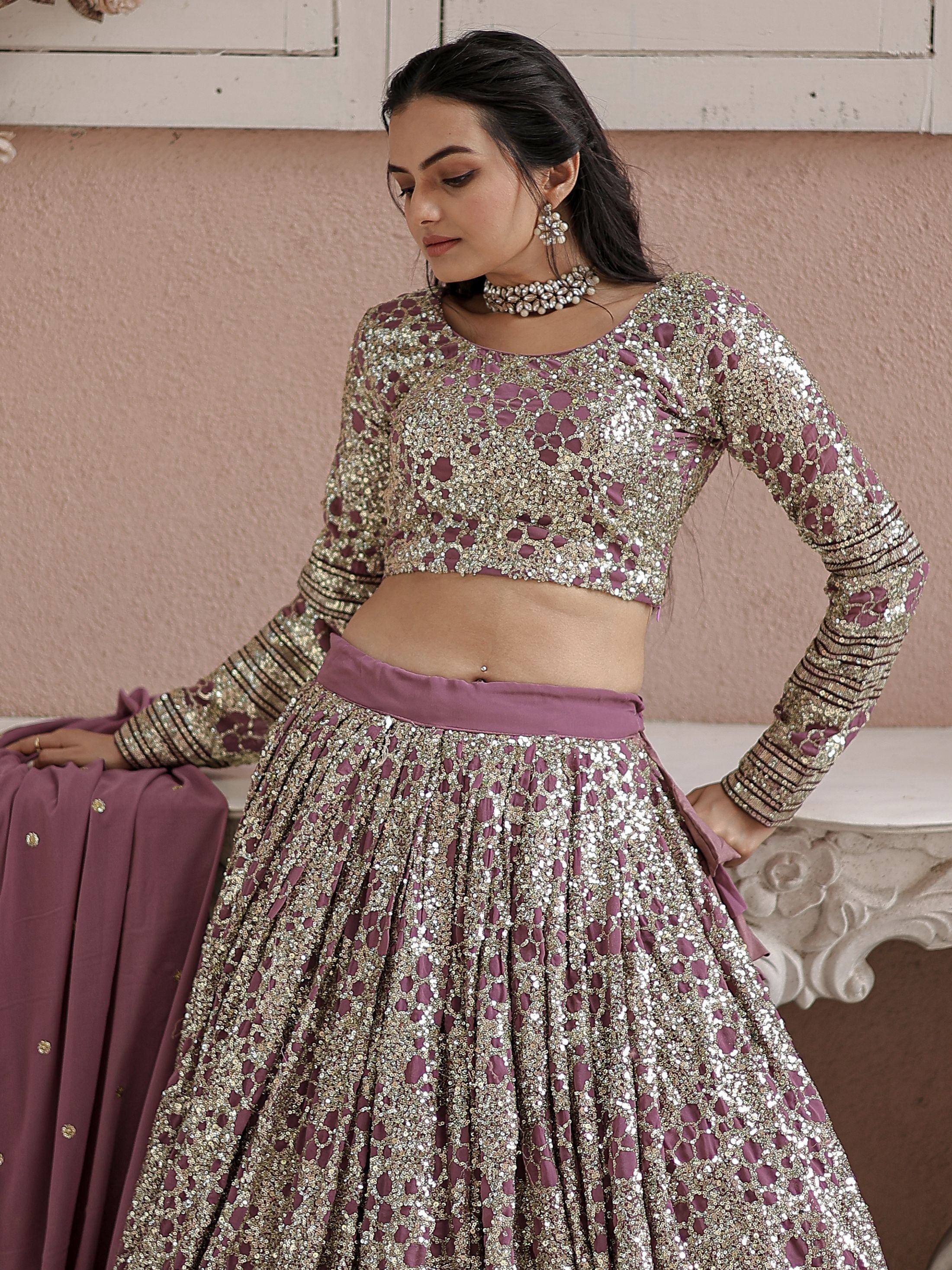Elegant mauve and gold sequin lehenga choli with intricate embroidery, perfect for Indian ethnic occasions.