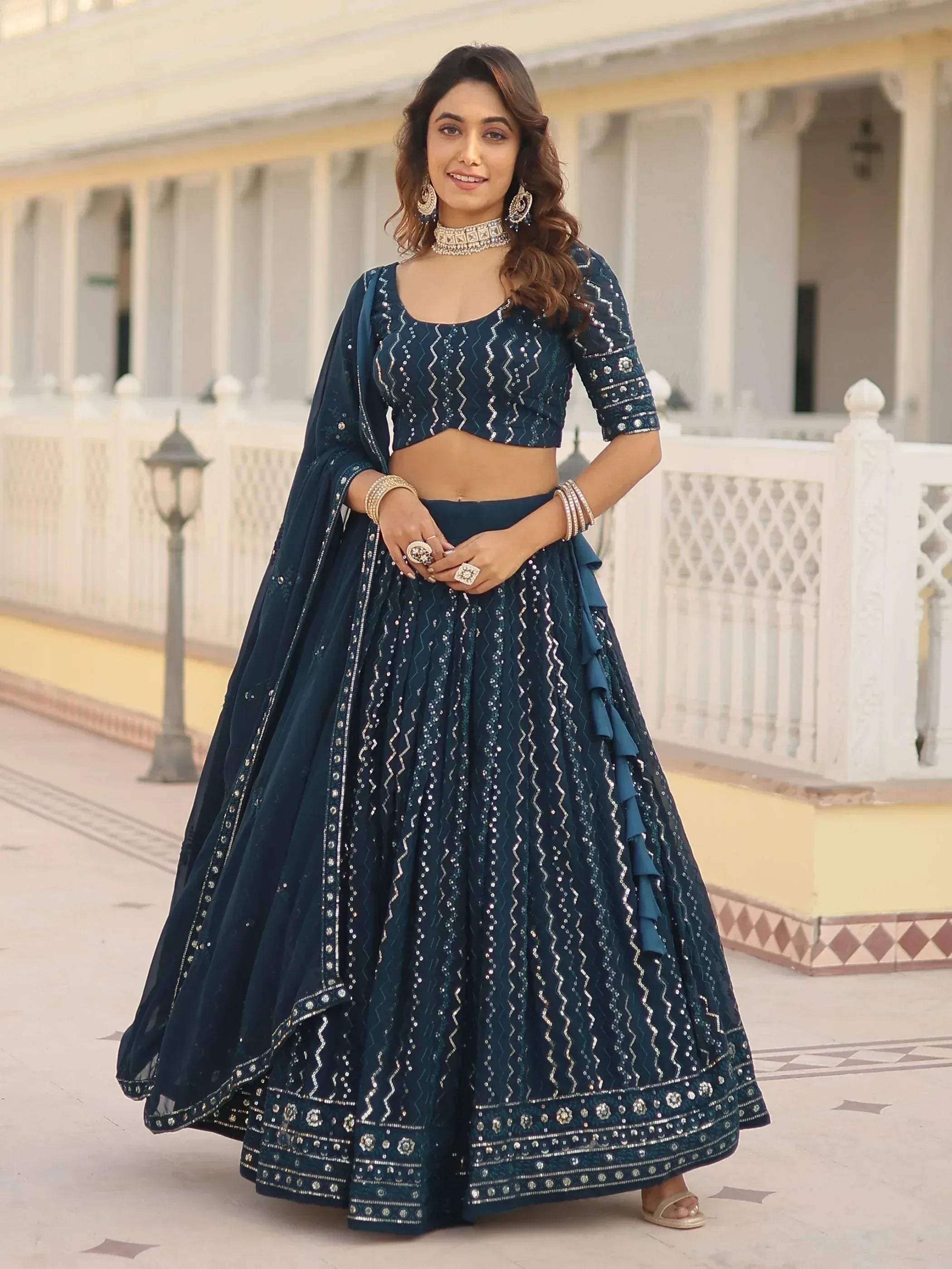 Elegant navy blue lehenga choli with silver embroidery, perfect for Indian ethnic wear and festive occasions.