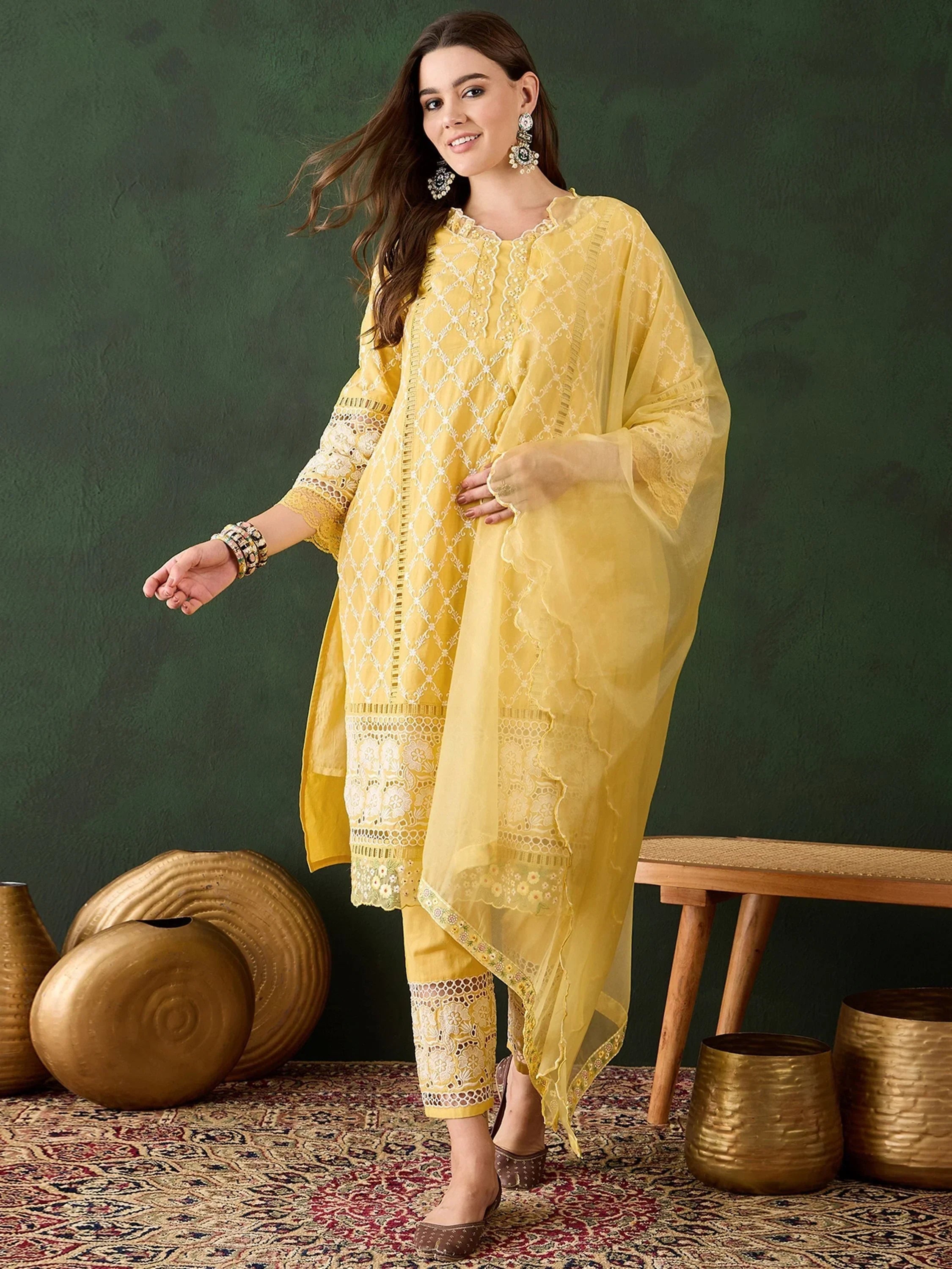 Woman in yellow embroidered salwar kameez with dupatta, ethnic Indian wear, festive look