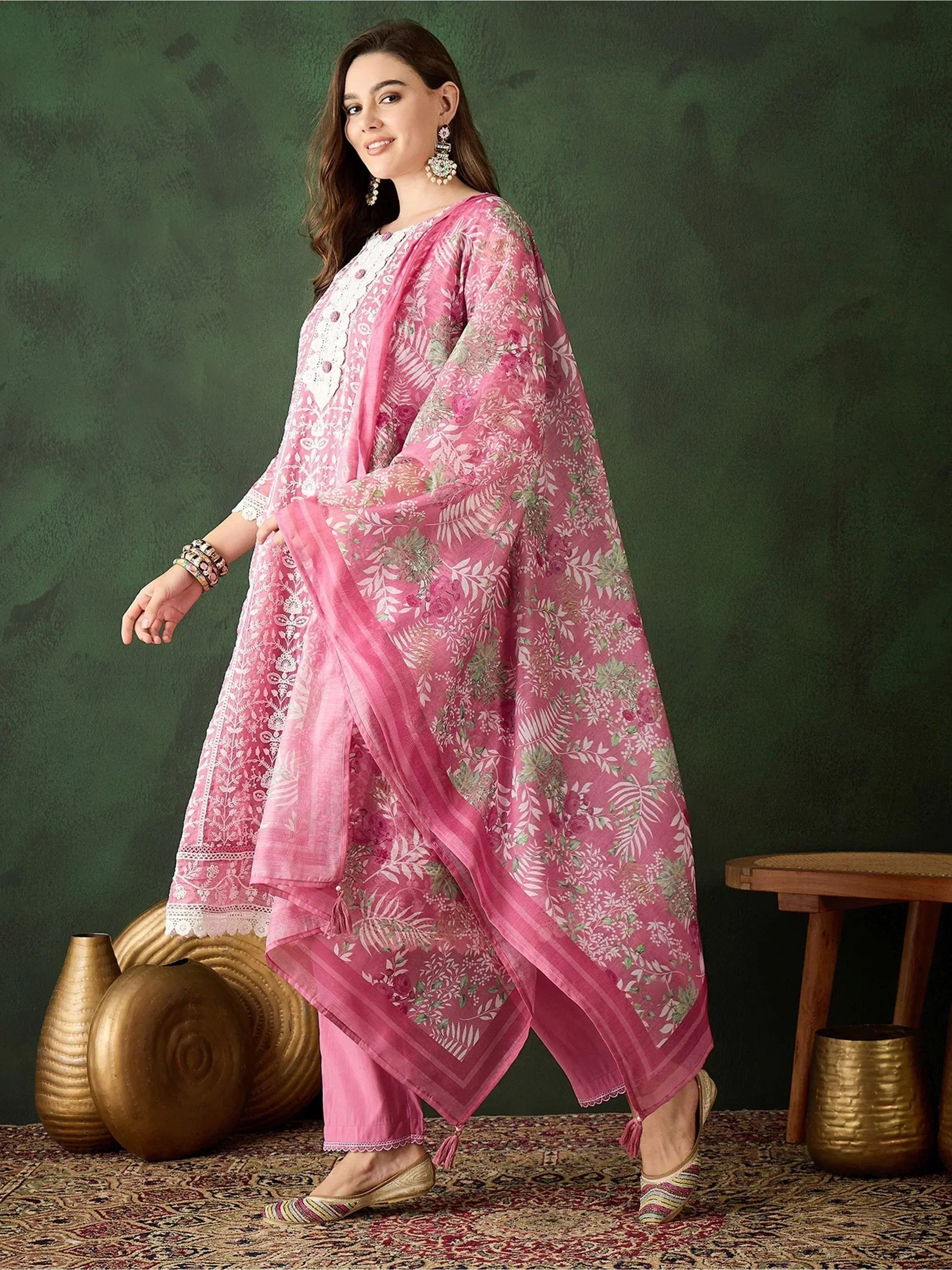 Pink floral printed salwar kameez with lace detailing, perfect for ethnic wear occasions