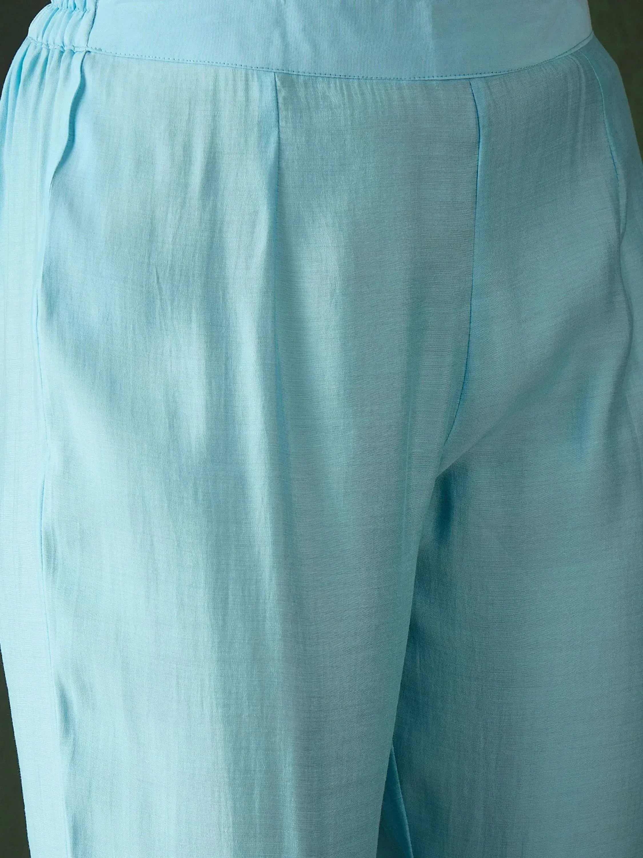 Light blue ethnic palazzo pants with elastic waist, ideal for salwar kameez or casual wear