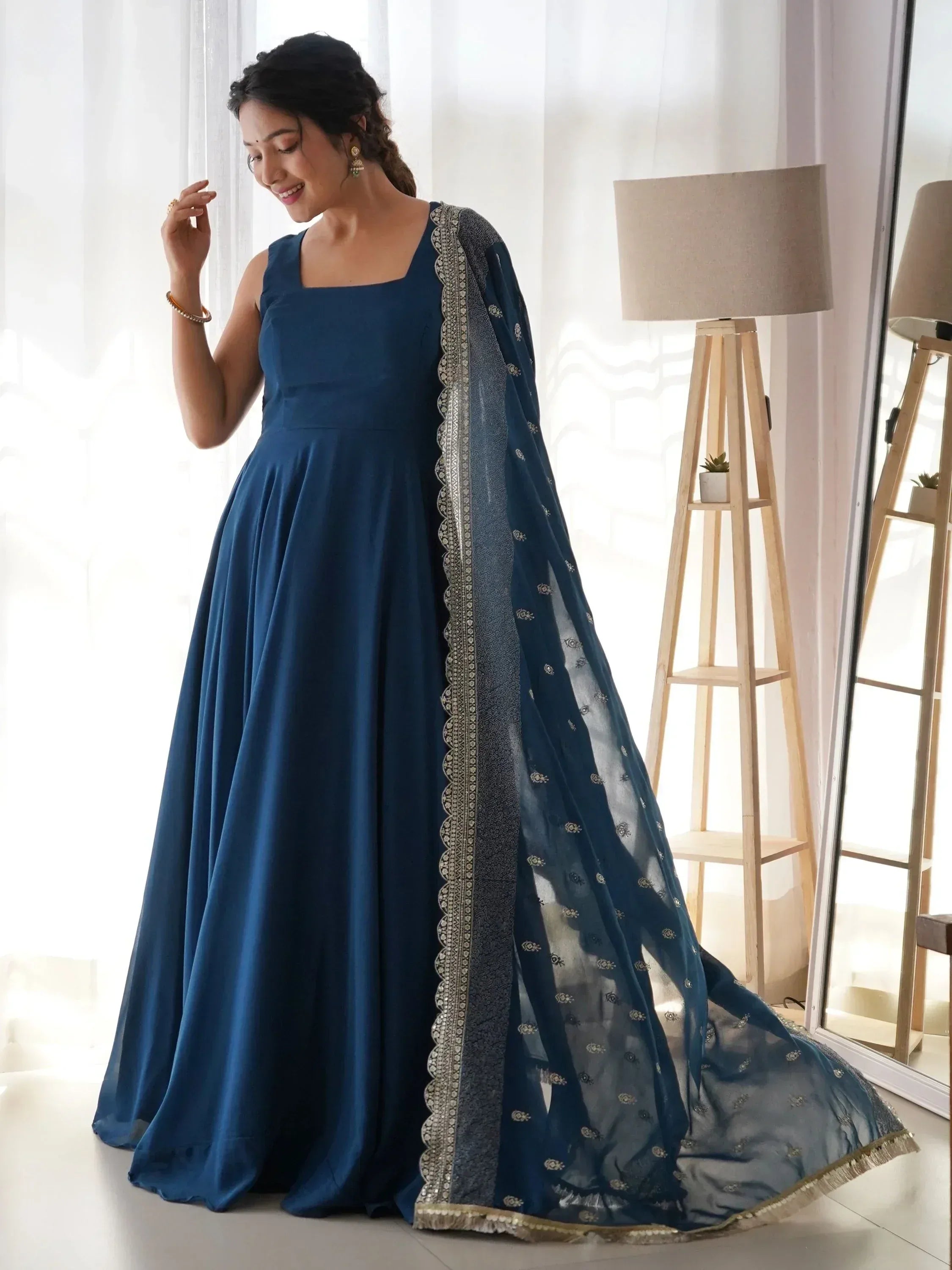 Elegant navy blue anarkali gown with embroidered dupatta, perfect for Indian ethnic occasions