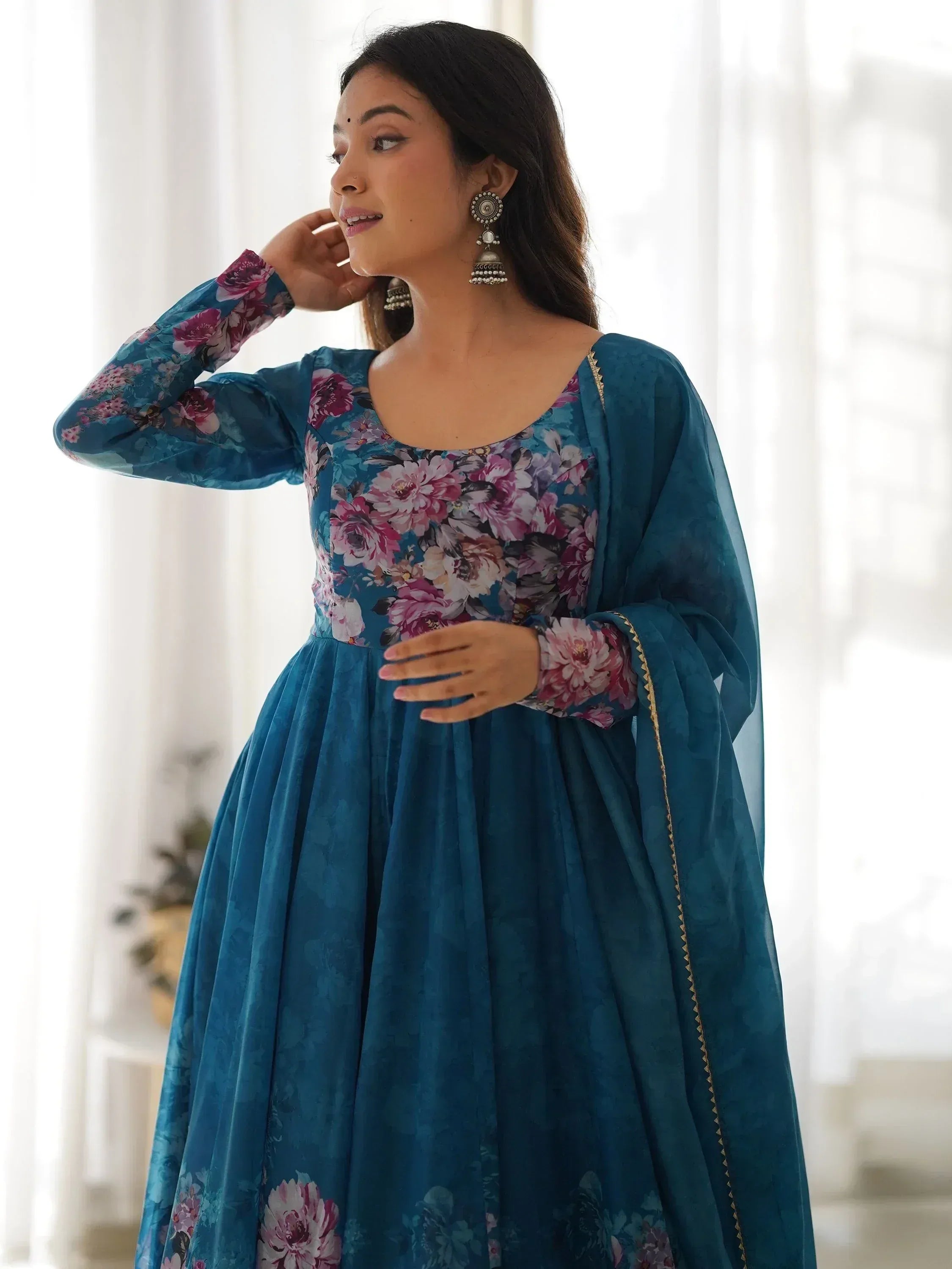 Teal floral anarkali suit with gold trim, perfect for Indian ethnic wear occasions
