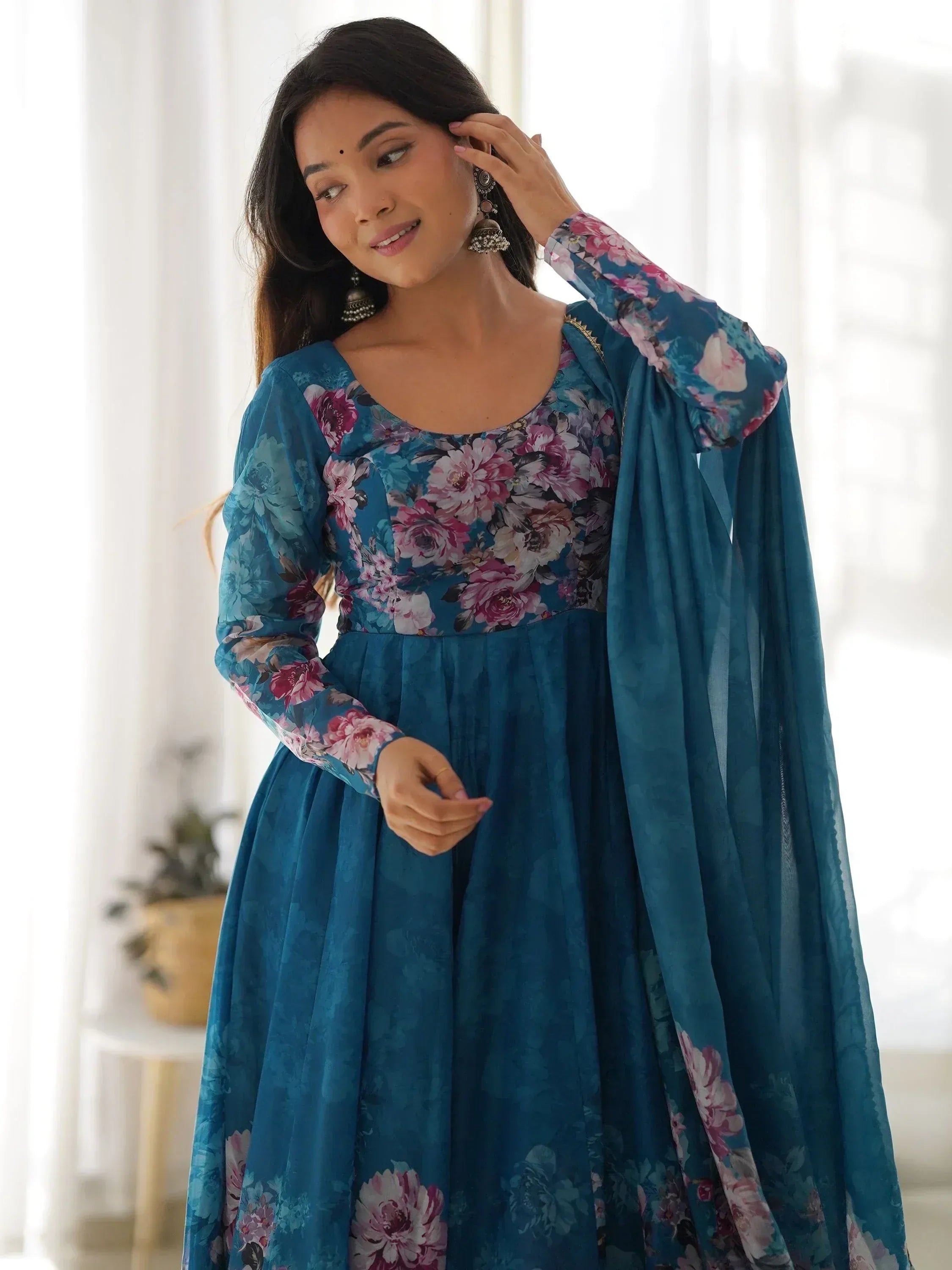 Teal floral print ethnic gown with long sleeves and dupatta, perfect for Indian occasions
