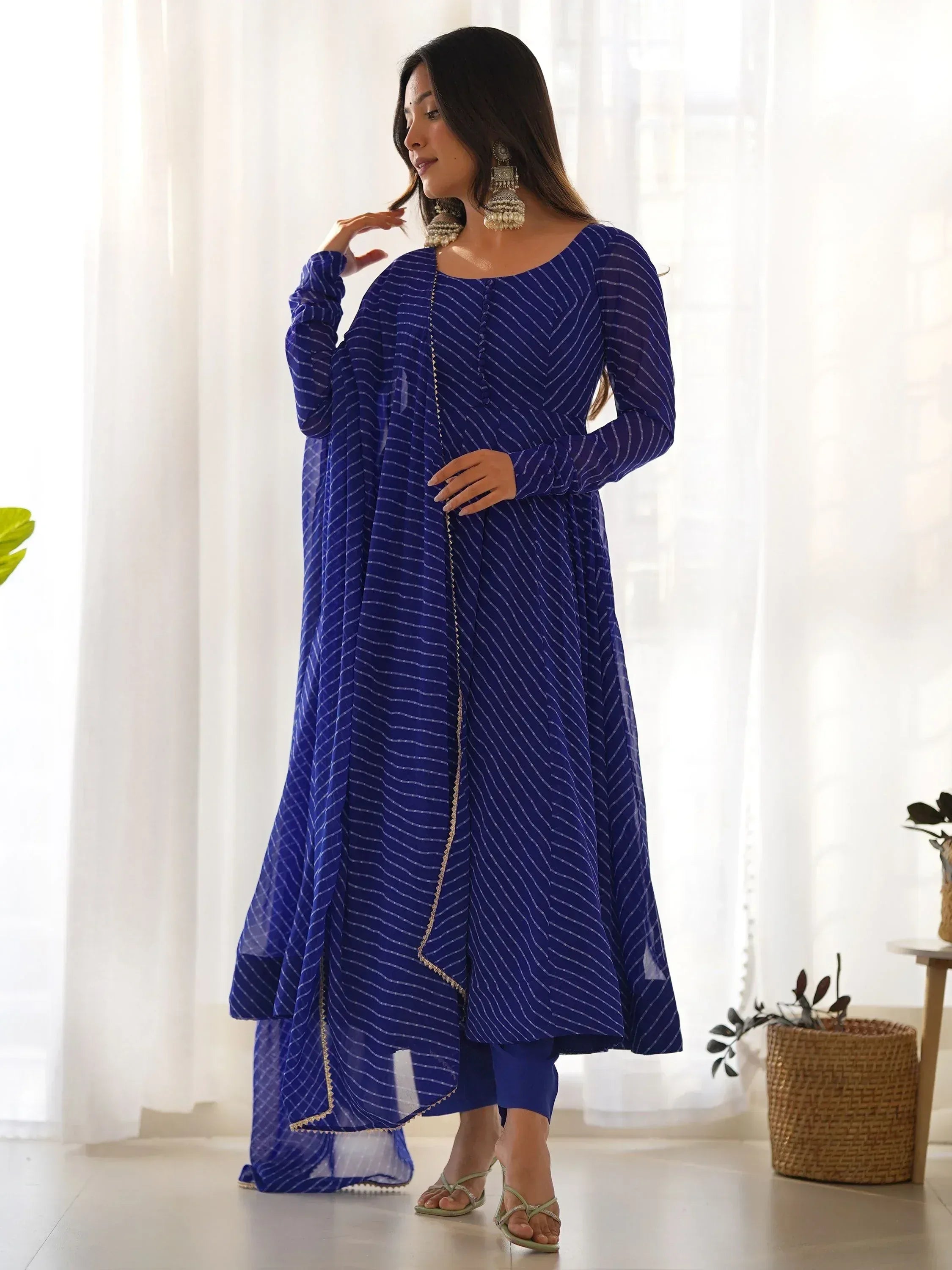 Blue striped ethnic kurta with matching palazzo and dupatta, perfect for Indian wear occasions