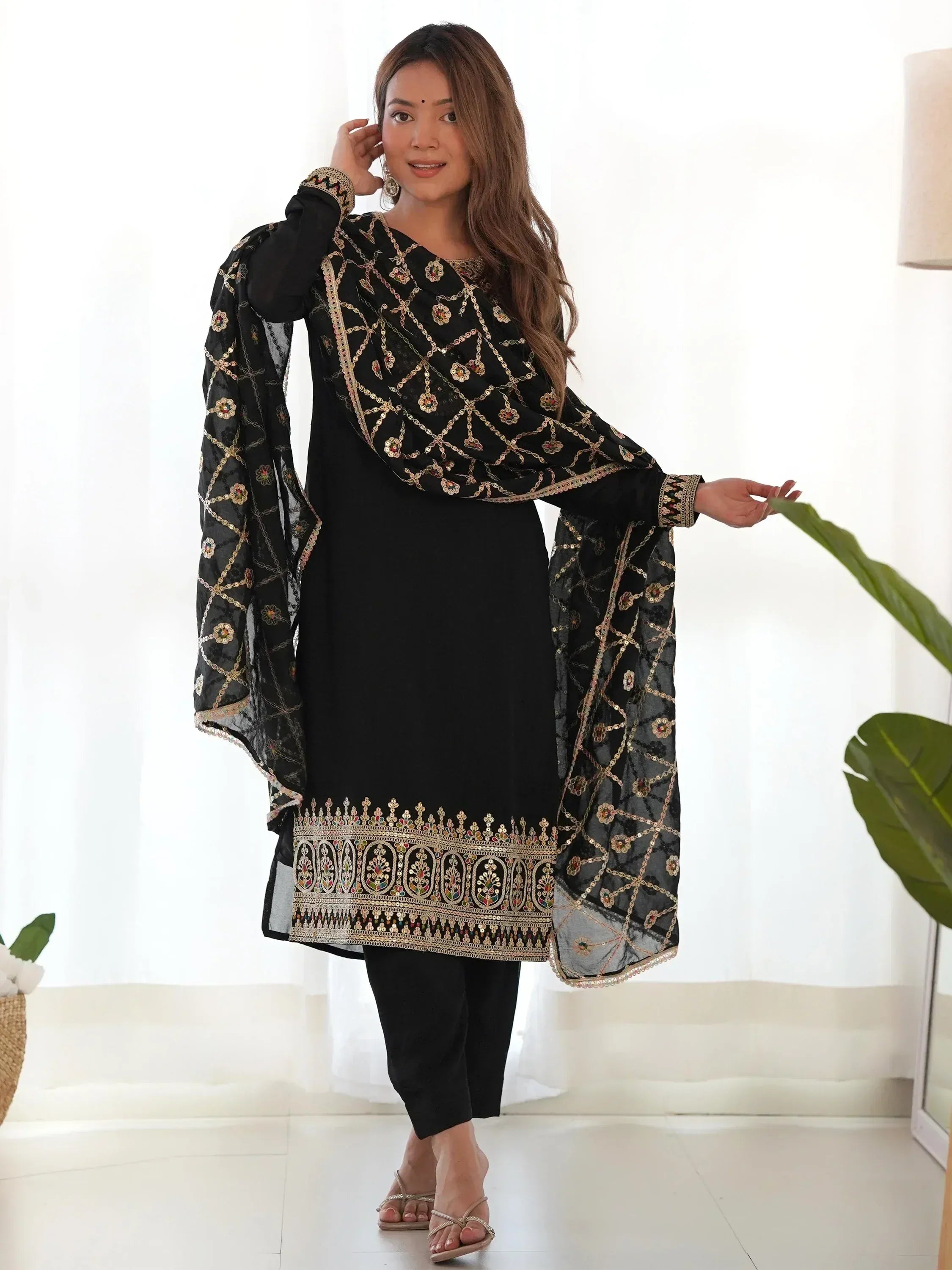 Black embroidered salwar kameez with floral dupatta, ethnic Indian wear for women