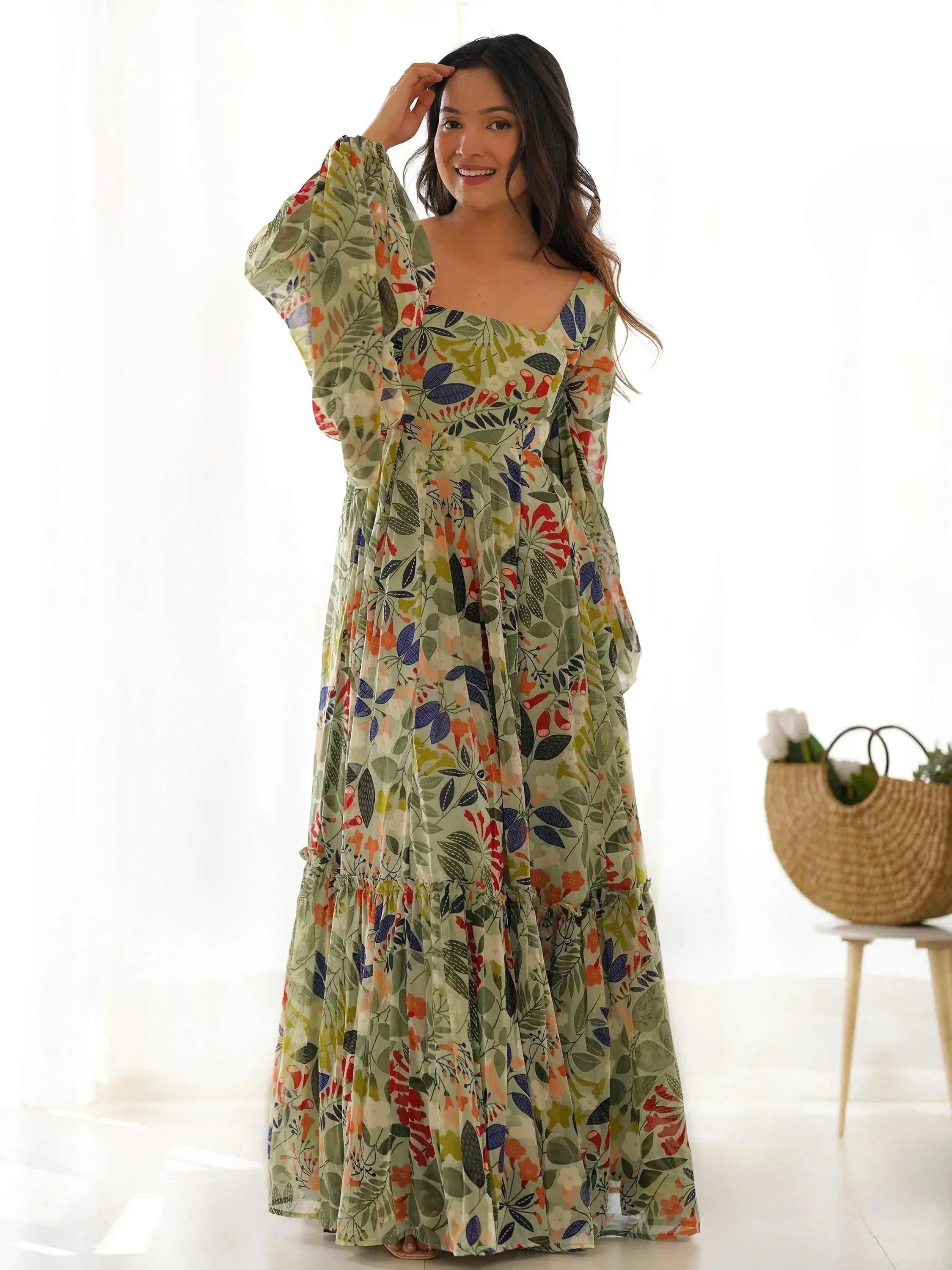 Floral print ethnic gown with bell sleeves, perfect for Indian occasions and festive wear.