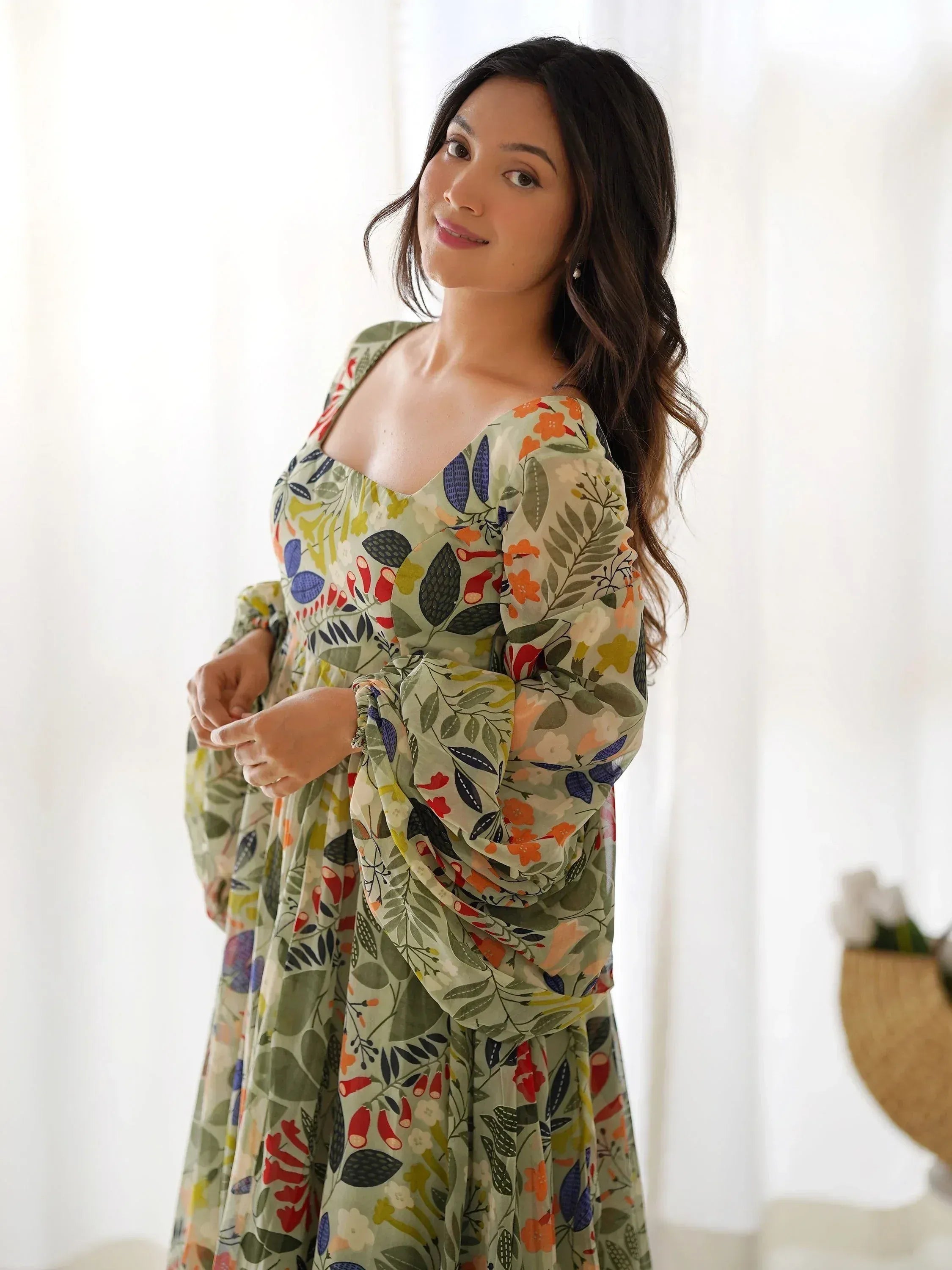 Floral print ethnic gown with puff sleeves, perfect for Indian occasions and casual wear.