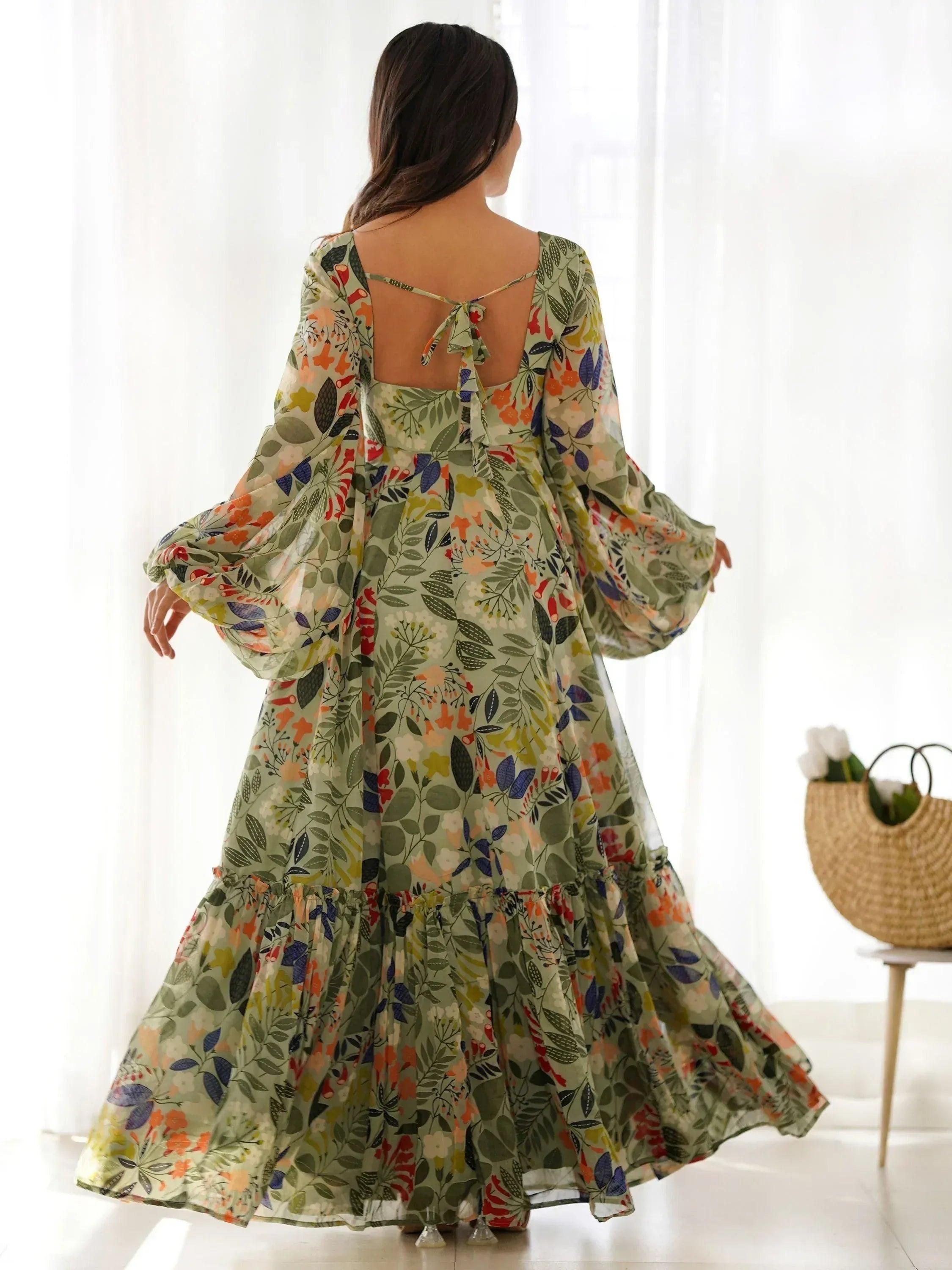 Floral print ethnic gown with bell sleeves and open back, perfect for Indian occasions