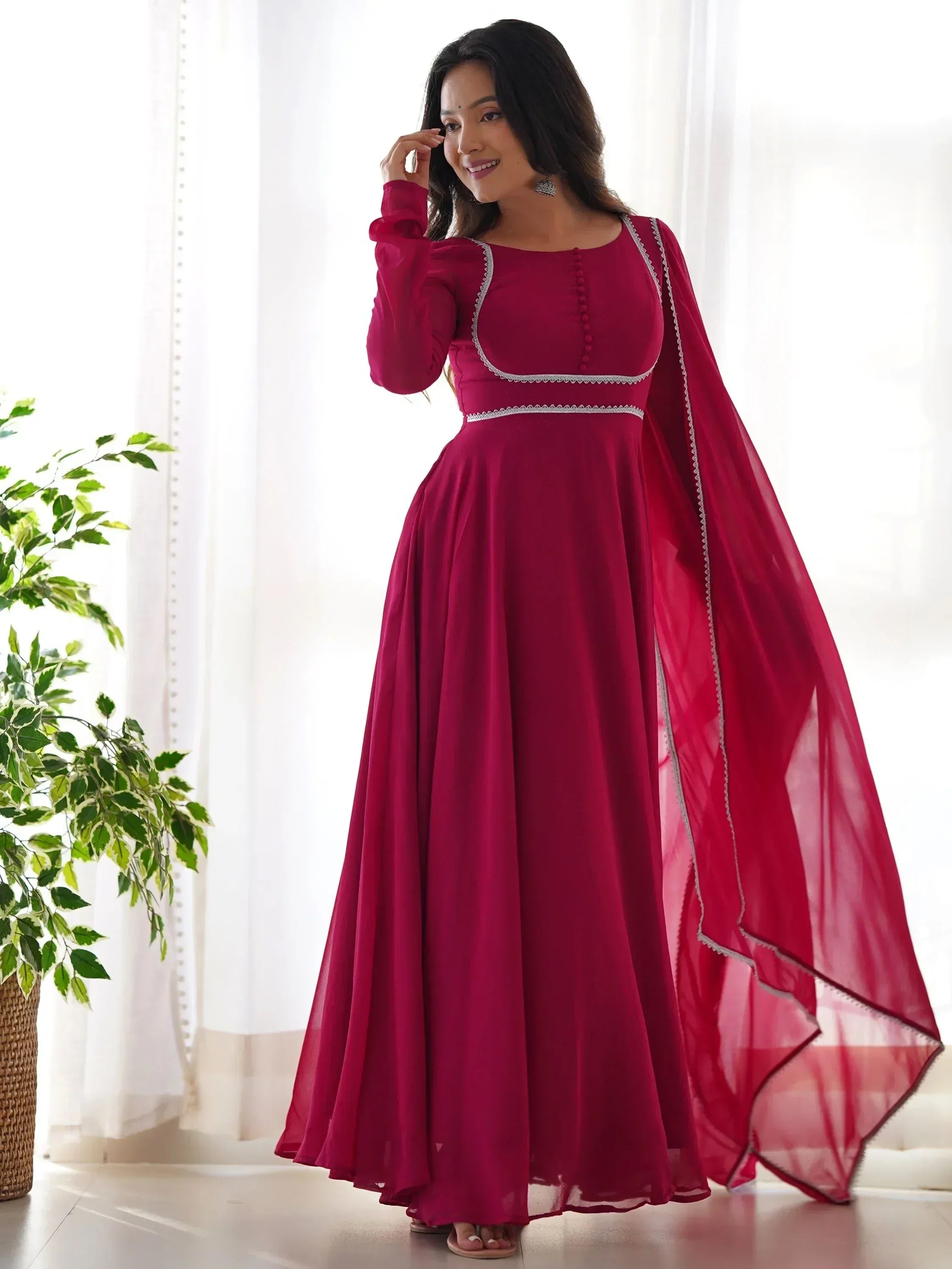 Elegant maroon ethnic gown with cape, perfect for Indian occasions and festive wear