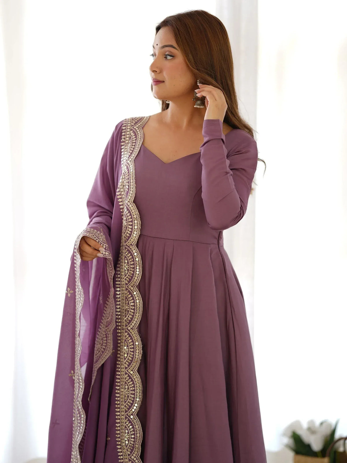 Purple ethnic anarkali with gold embroidery, perfect for Indian occasions and festive wear