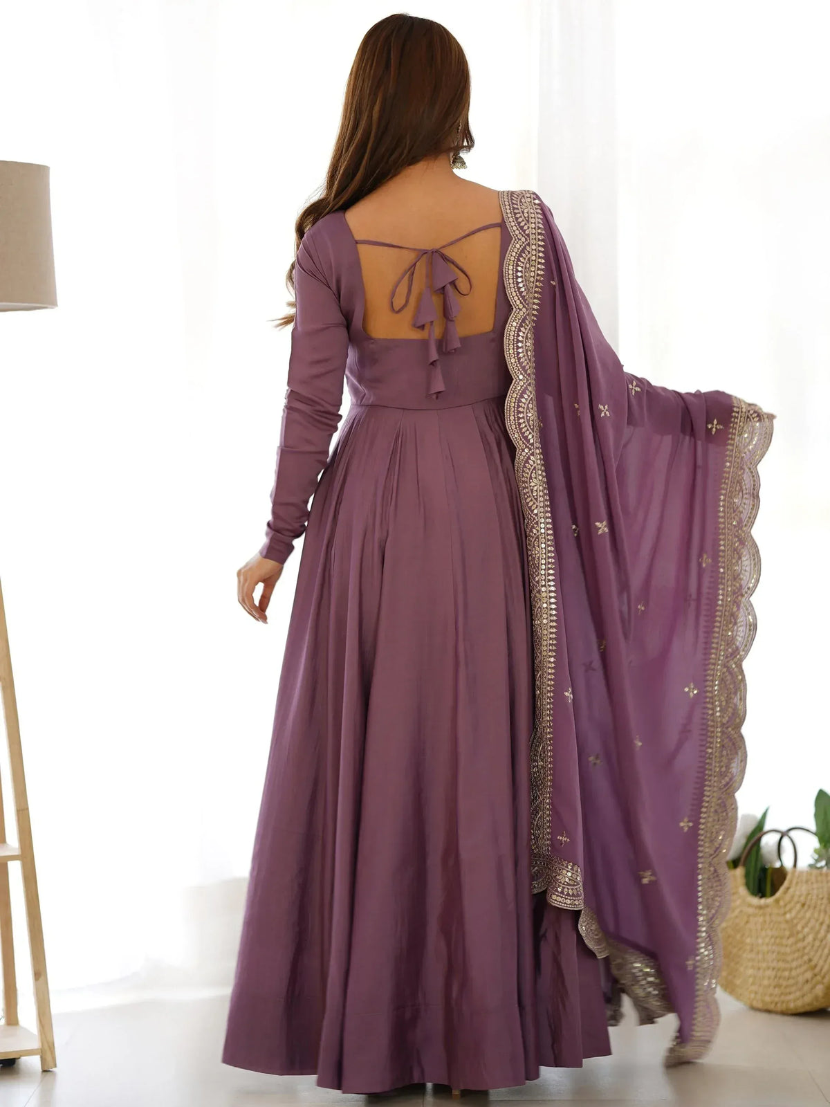 Purple ethnic anarkali gown with back tie and gold-embroidered dupatta, ideal for Indian occasions