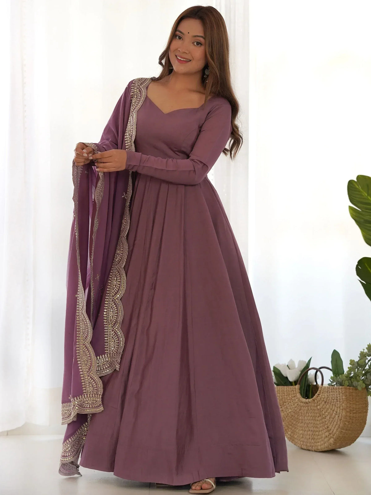 Purple ethnic anarkali gown with gold embroidery, perfect for Indian occasions and festive wear
