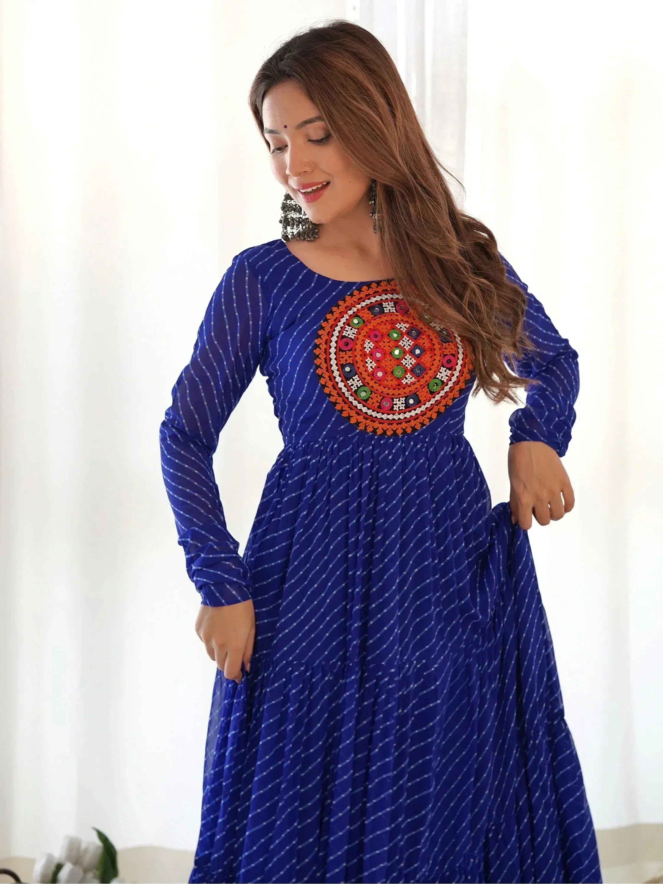 Blue ethnic gown with colorful mirror work, perfect for Indian festive occasions and parties