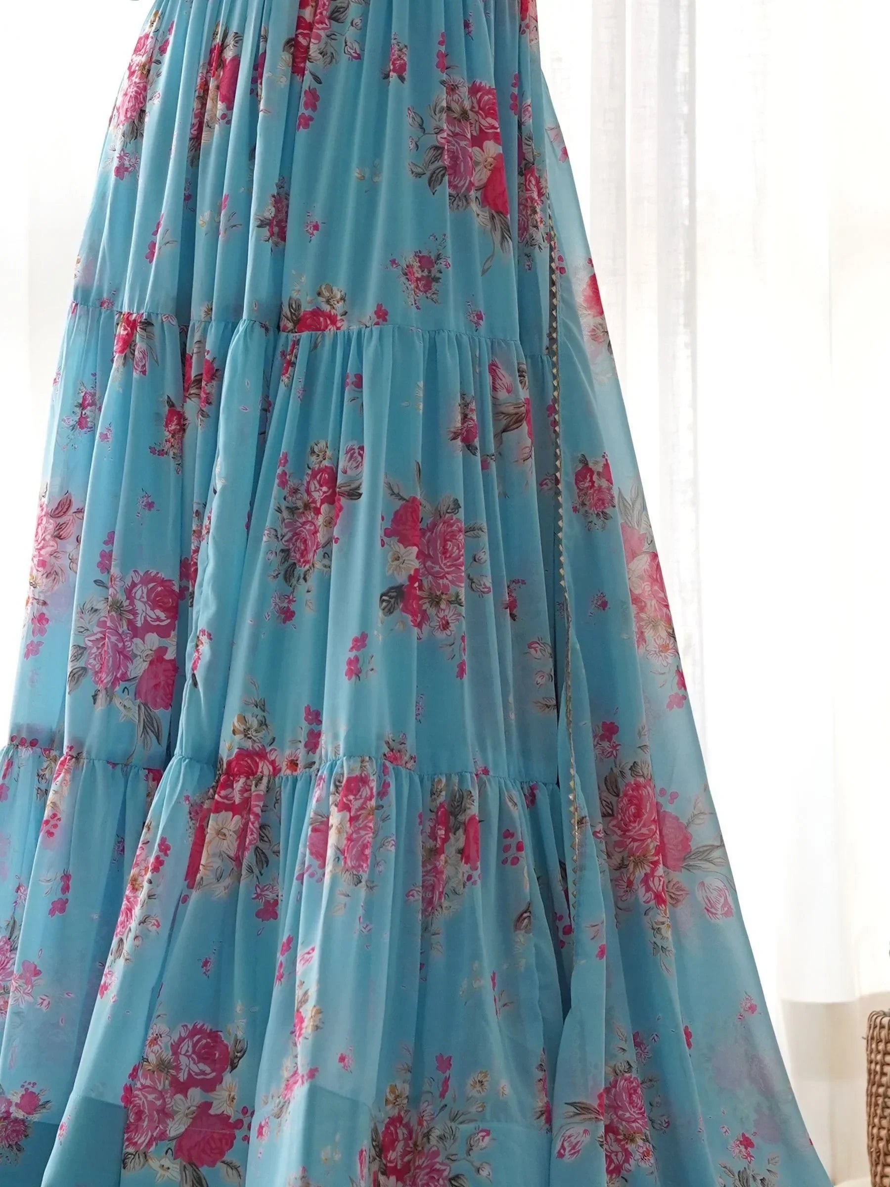 Blue floral printed ethnic gown with pink and red flowers, lightweight fabric