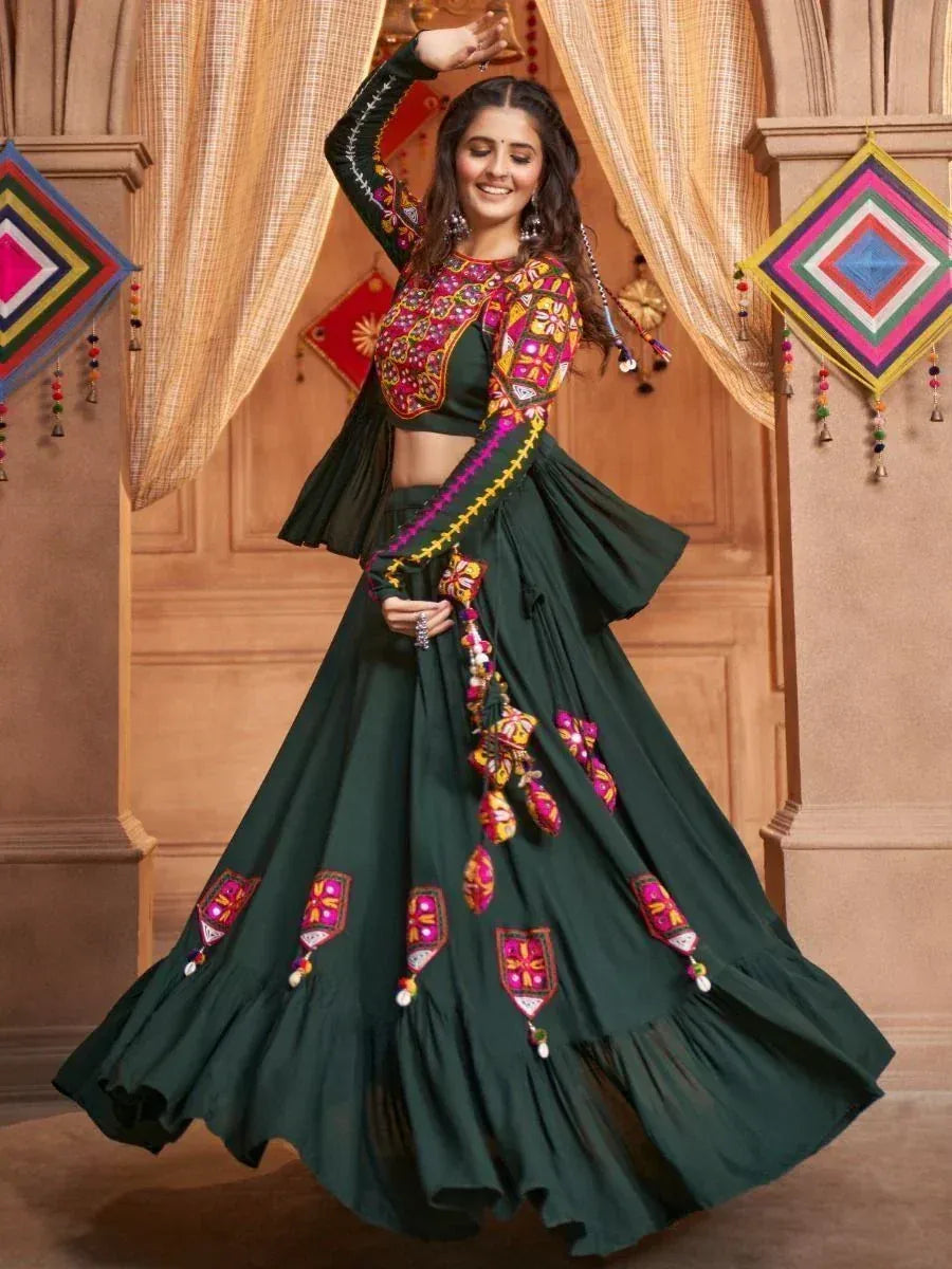 Green embroidered lehenga choli with mirror work, perfect for Indian ethnic occasions