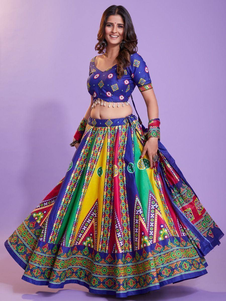 Colorful Indian lehenga choli with vibrant geometric prints, perfect for festive occasions and ethnic wear.