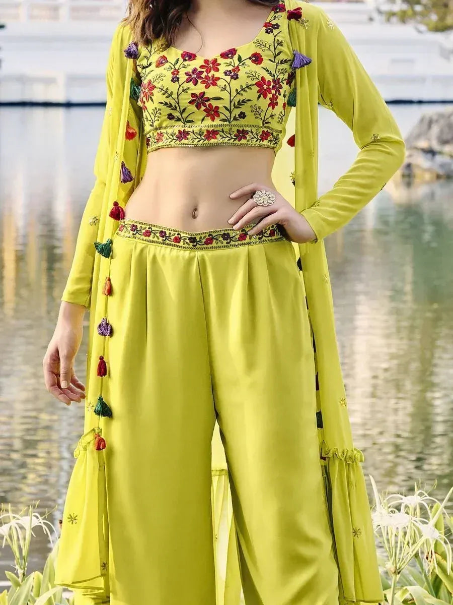 Green ethnic crop top with red floral embroidery, matching palazzo pants, and long dupatta