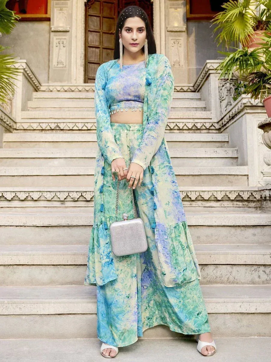 Woman in blue green tie-dye ethnic palazzo set with crop top and dupatta, perfect for Indian occasions