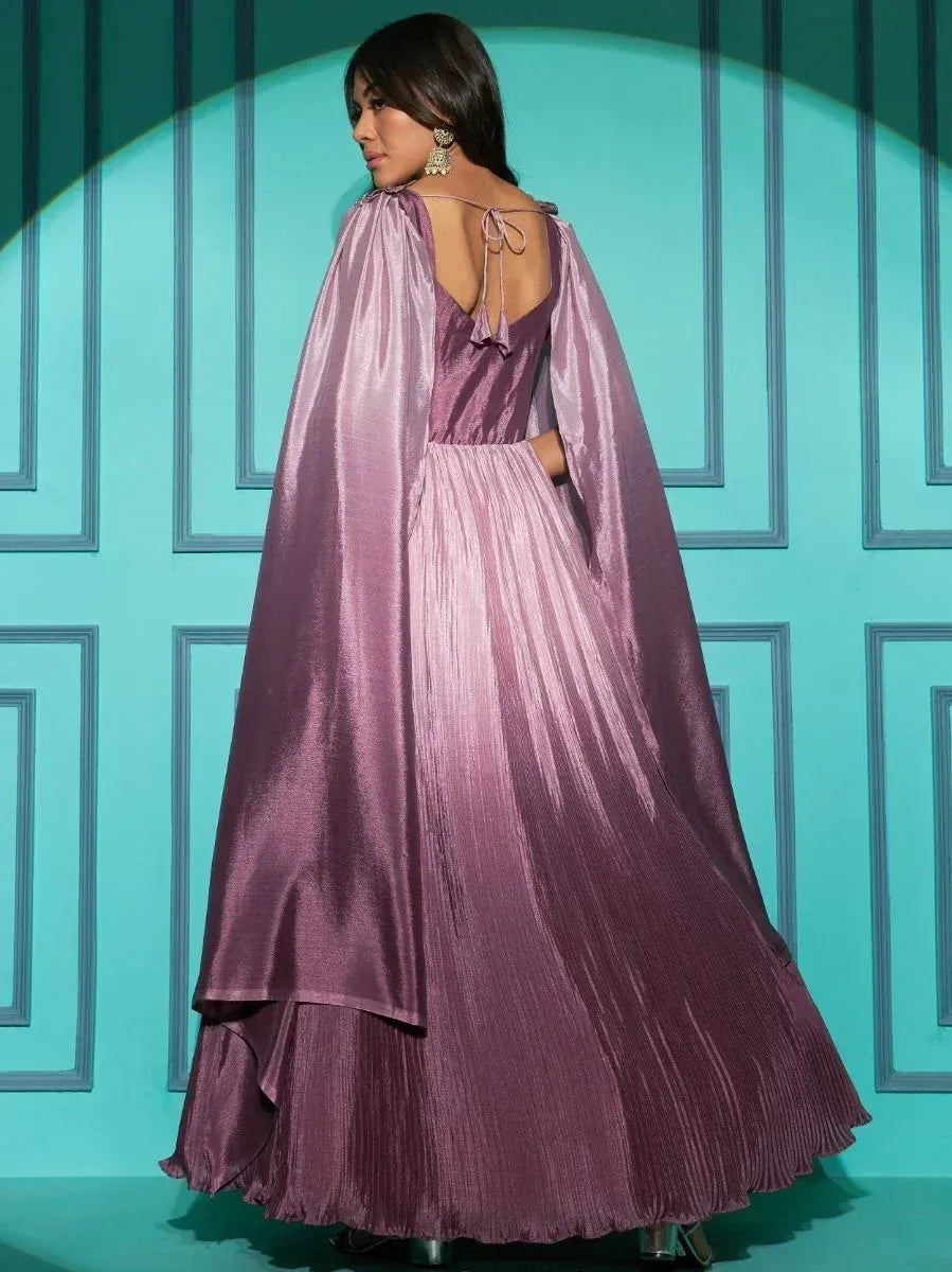 Purple pleated ethnic gown with cape back, perfect for Indian festive occasions
