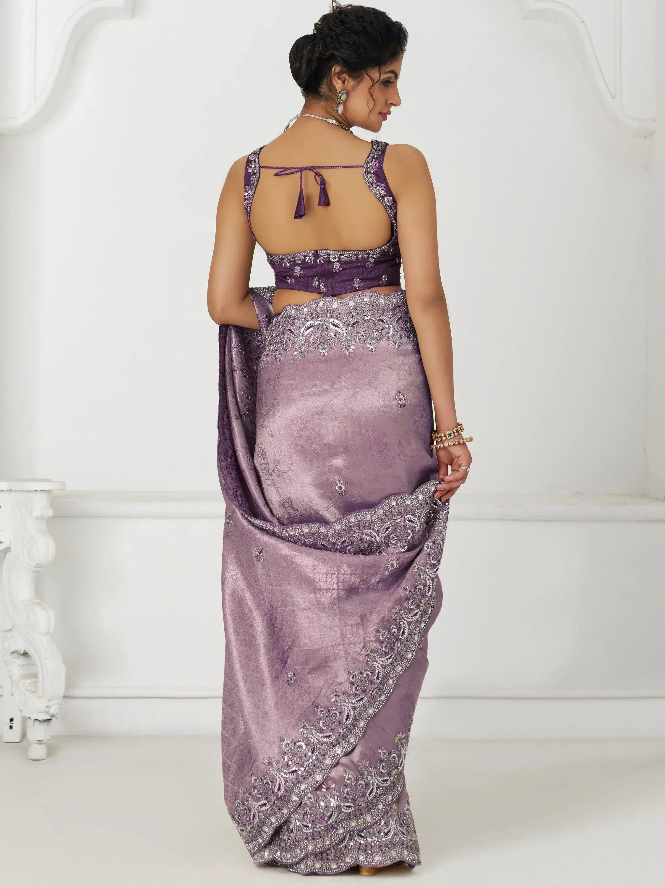 Purple designer saree with embroidered blouse and scalloped border, ethnic wear for women