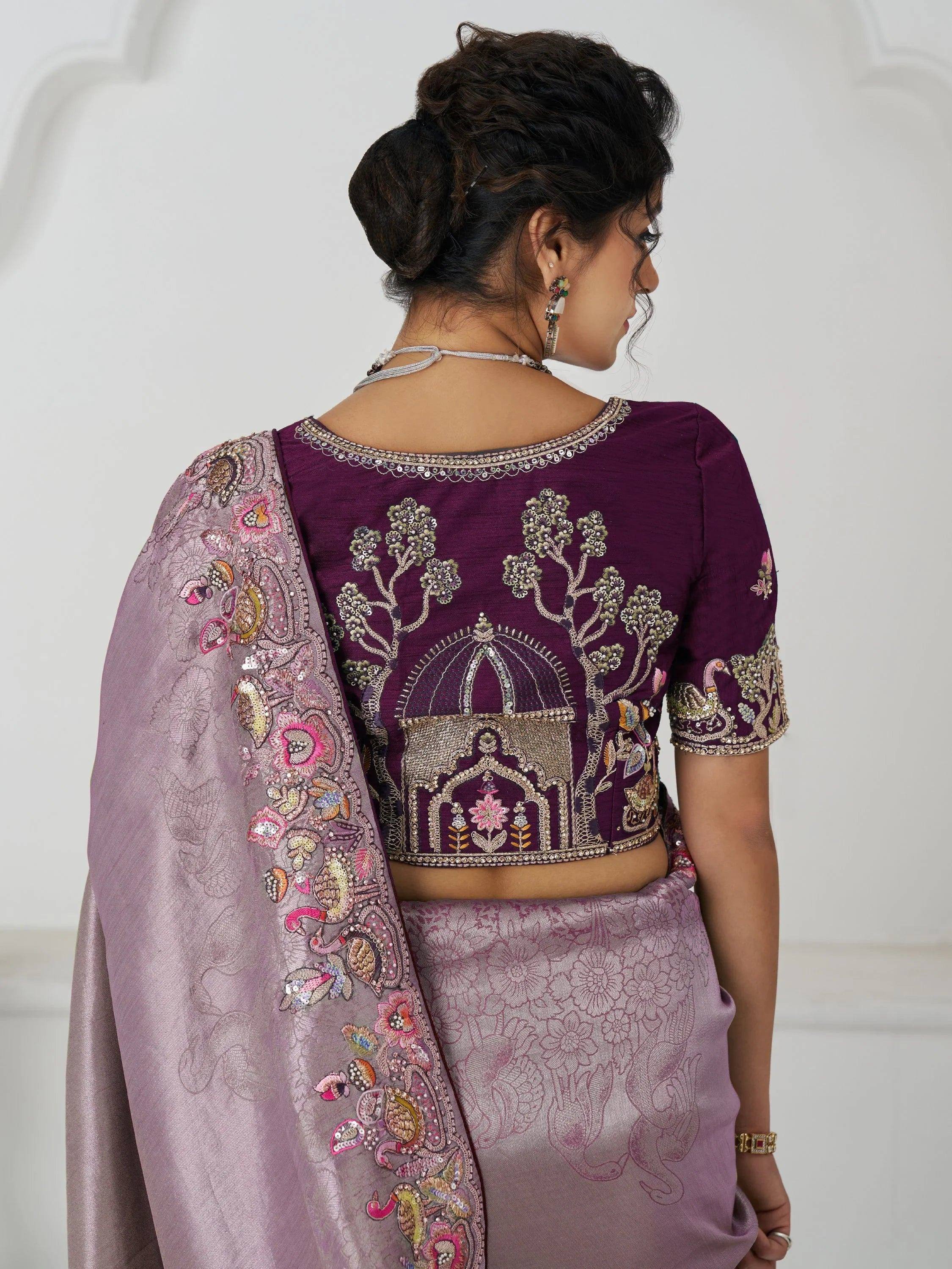 Purple embroidered lehenga choli with floral and peacock motifs, perfect for Indian ethnic wear
