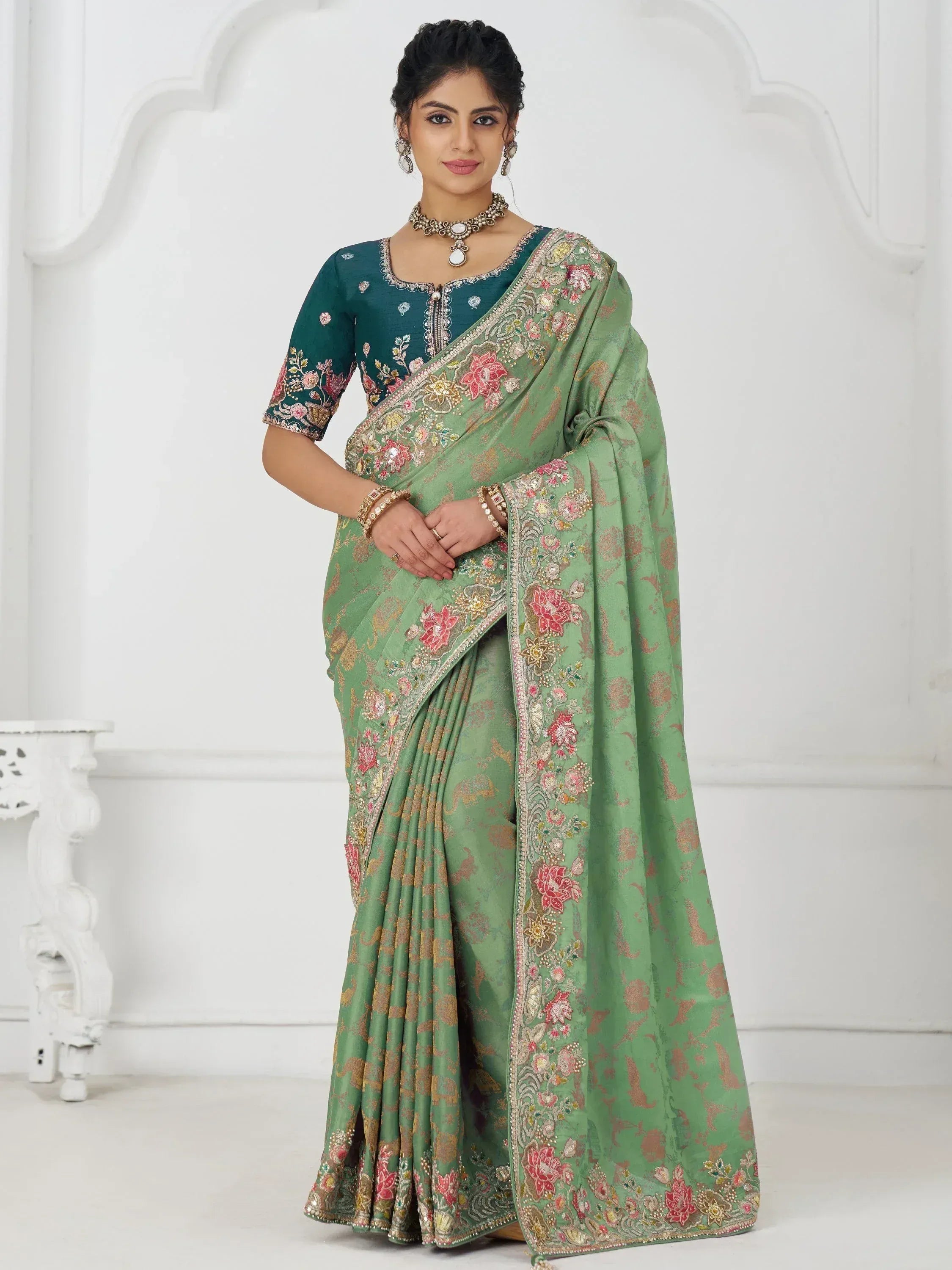 Green embroidered saree with floral motifs and matching blouse, Indian ethnic wear