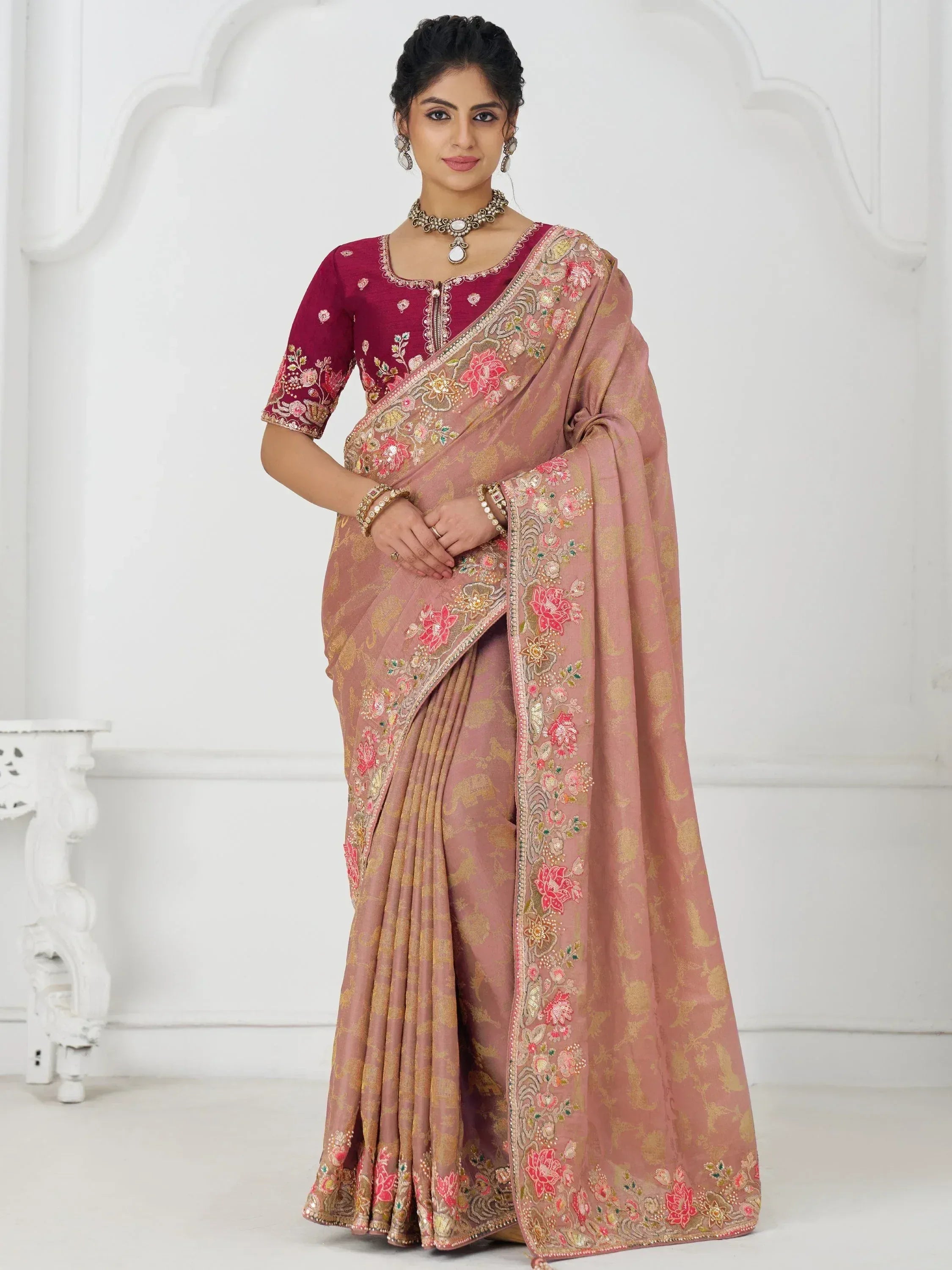 Elegant pink floral embroidered saree with maroon blouse, perfect for Indian ethnic occasions