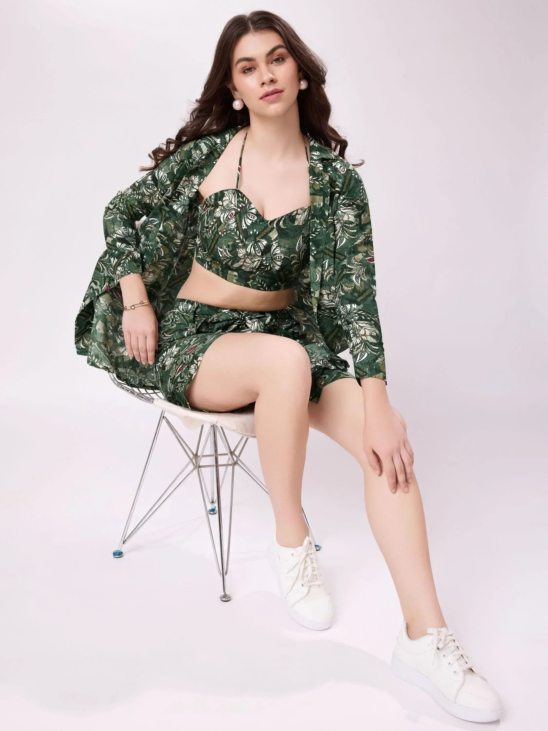 Green floral print ethnic crop top with matching shorts and jacket, styled with white sneakers