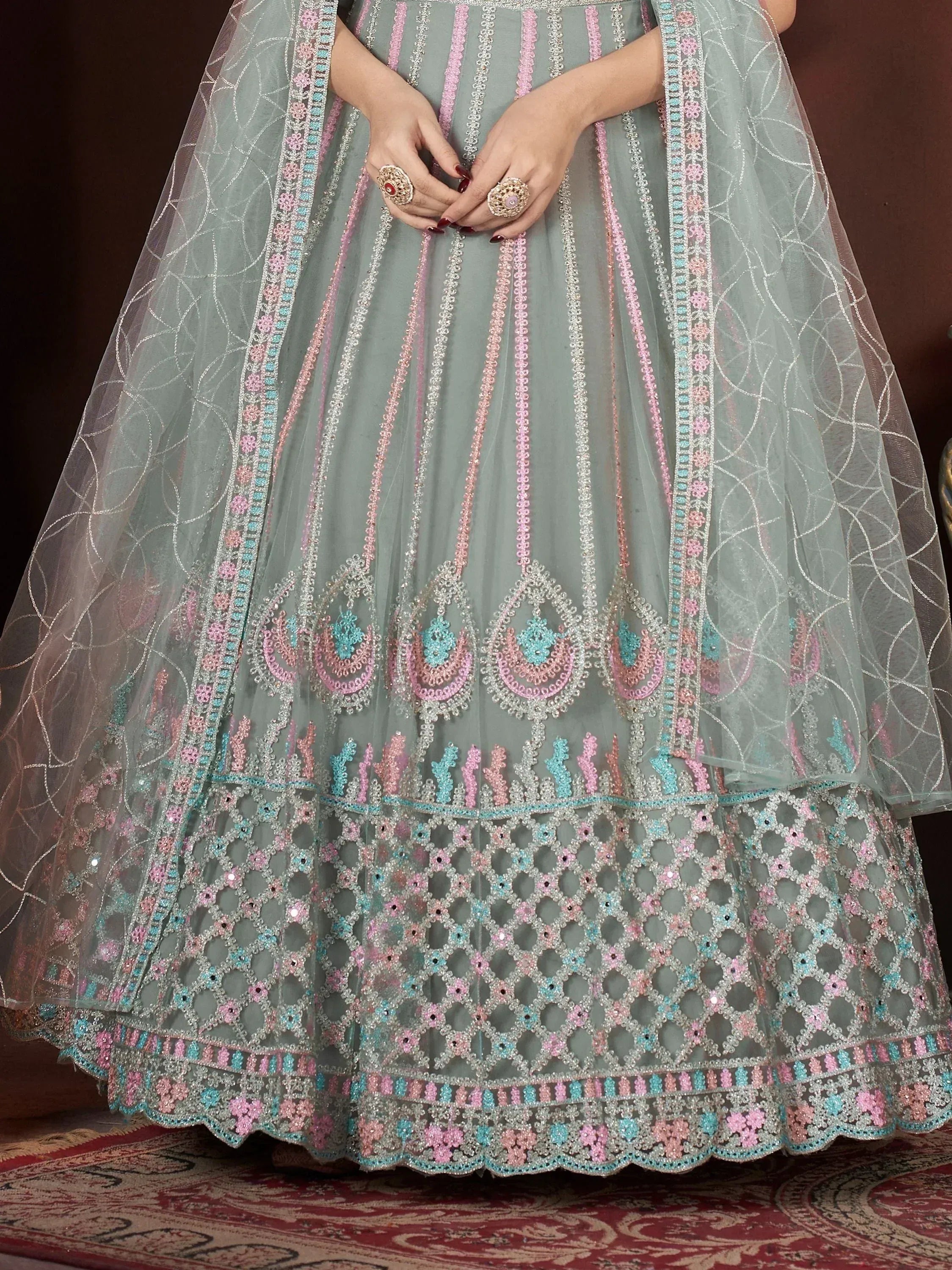 Elegant grey lehenga with pink and blue embroidery, perfect for Indian ethnic wear