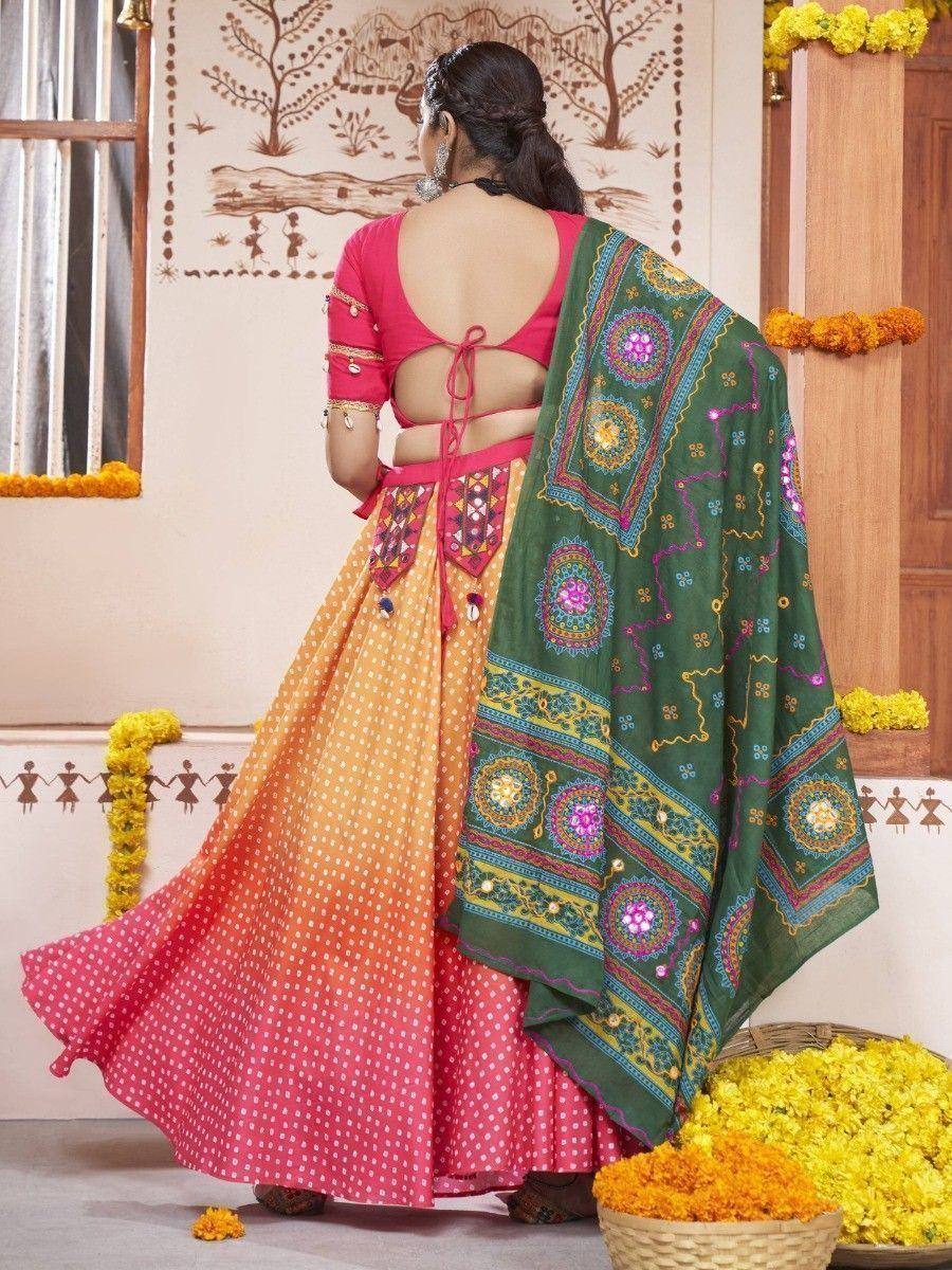 Woman in vibrant ombre lehenga choli with embroidered green dupatta, perfect for Indian ethnic occasions