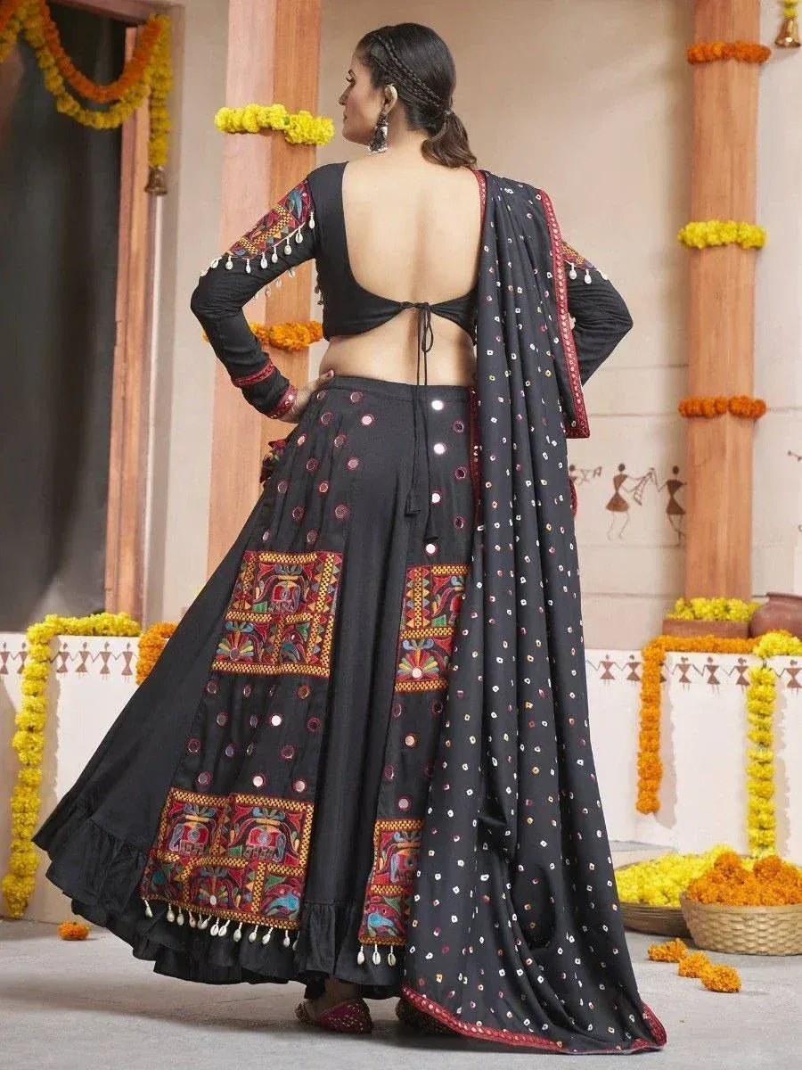 Black embroidered lehenga choli with mirror work and dupatta, Indian ethnic wear for festive occasions