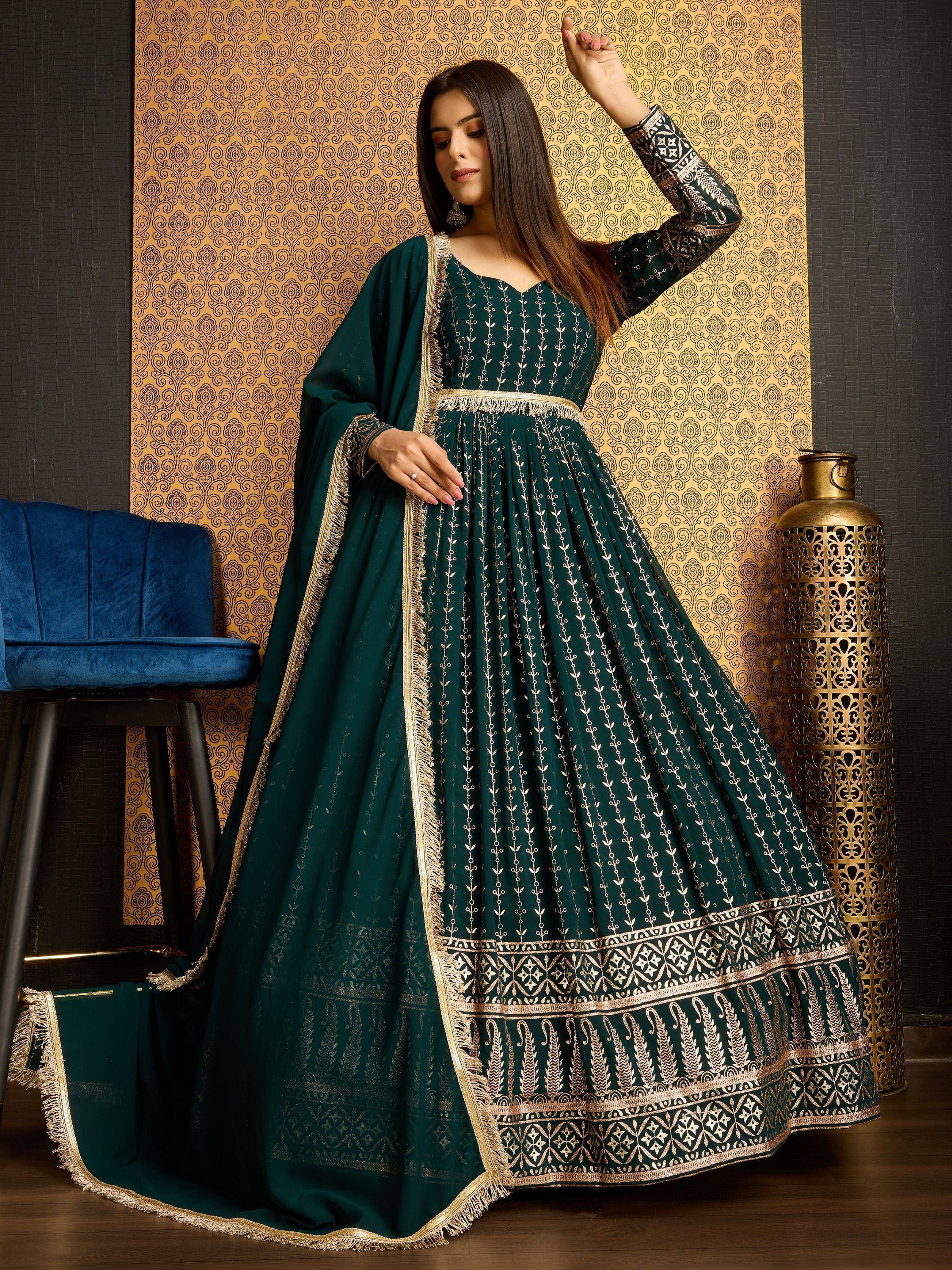 Emerald green embroidered anarkali suit with gold detailing, perfect for Indian ethnic occasions