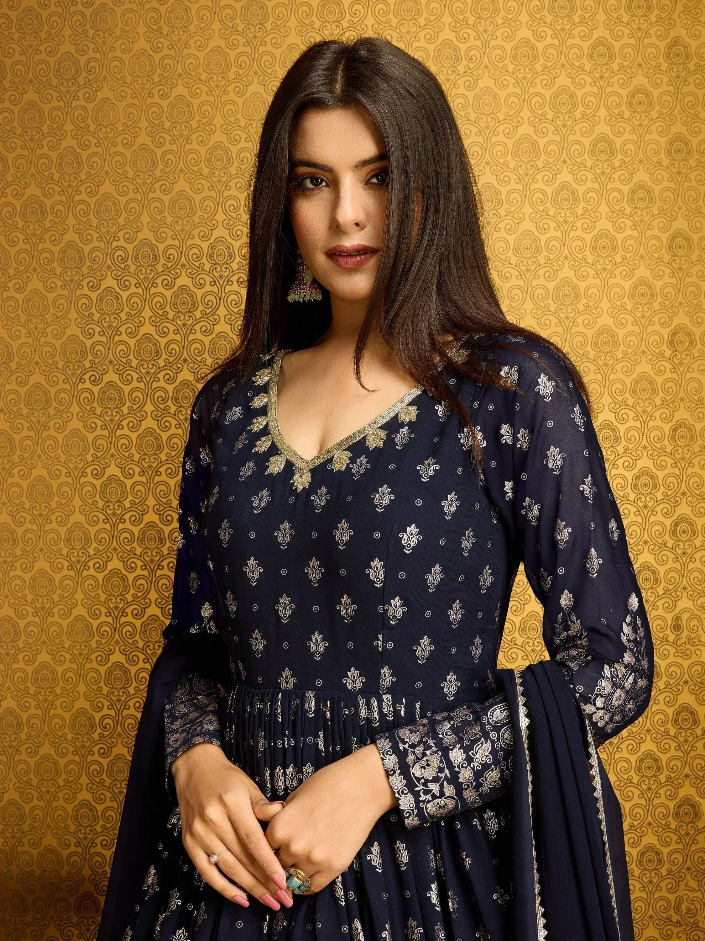 Navy blue ethnic gown with gold embroidery, perfect for Indian festive occasions and parties.