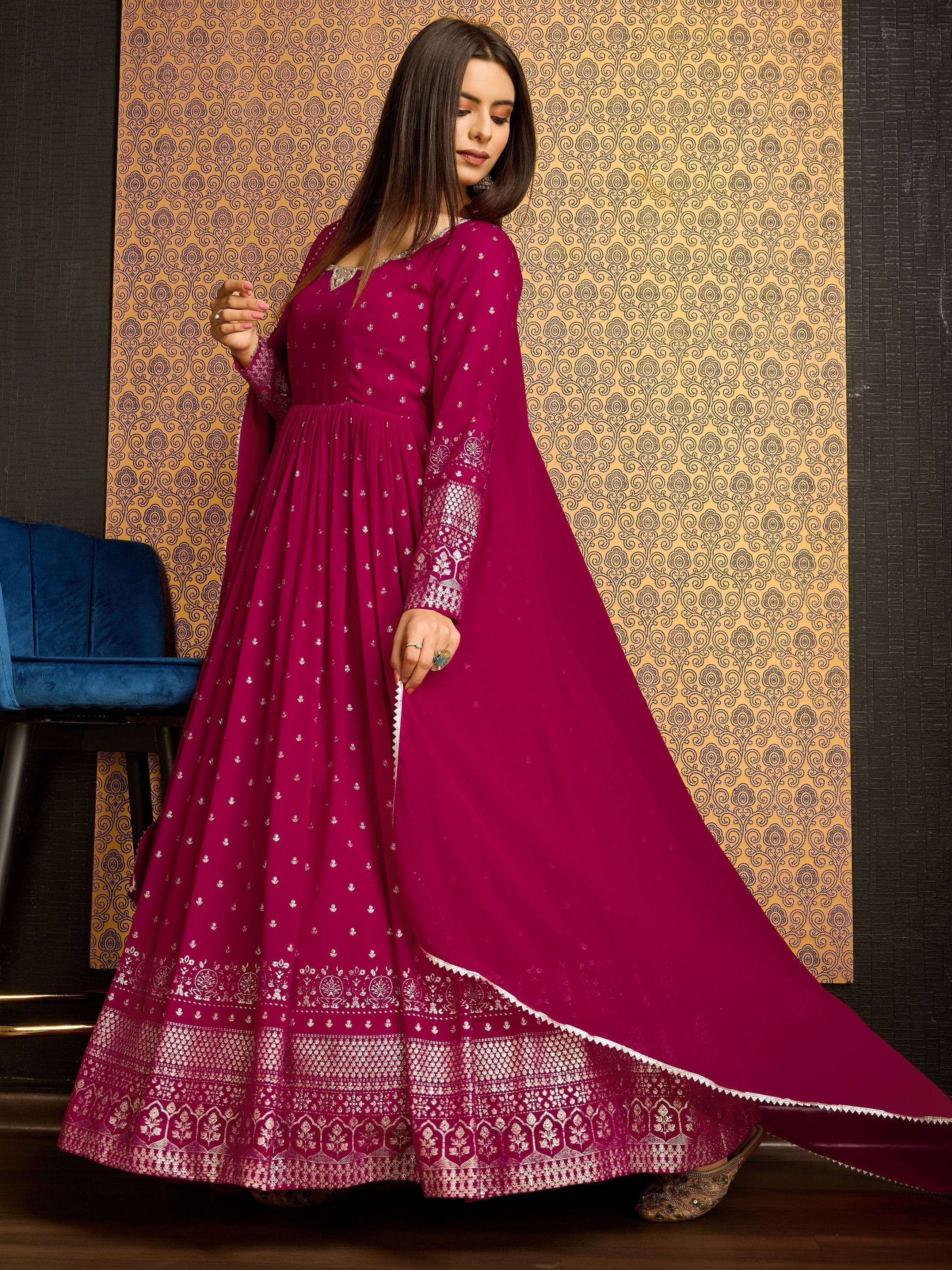 Magenta ethnic anarkali gown with silver embroidery, perfect for Indian weddings and festive occasions