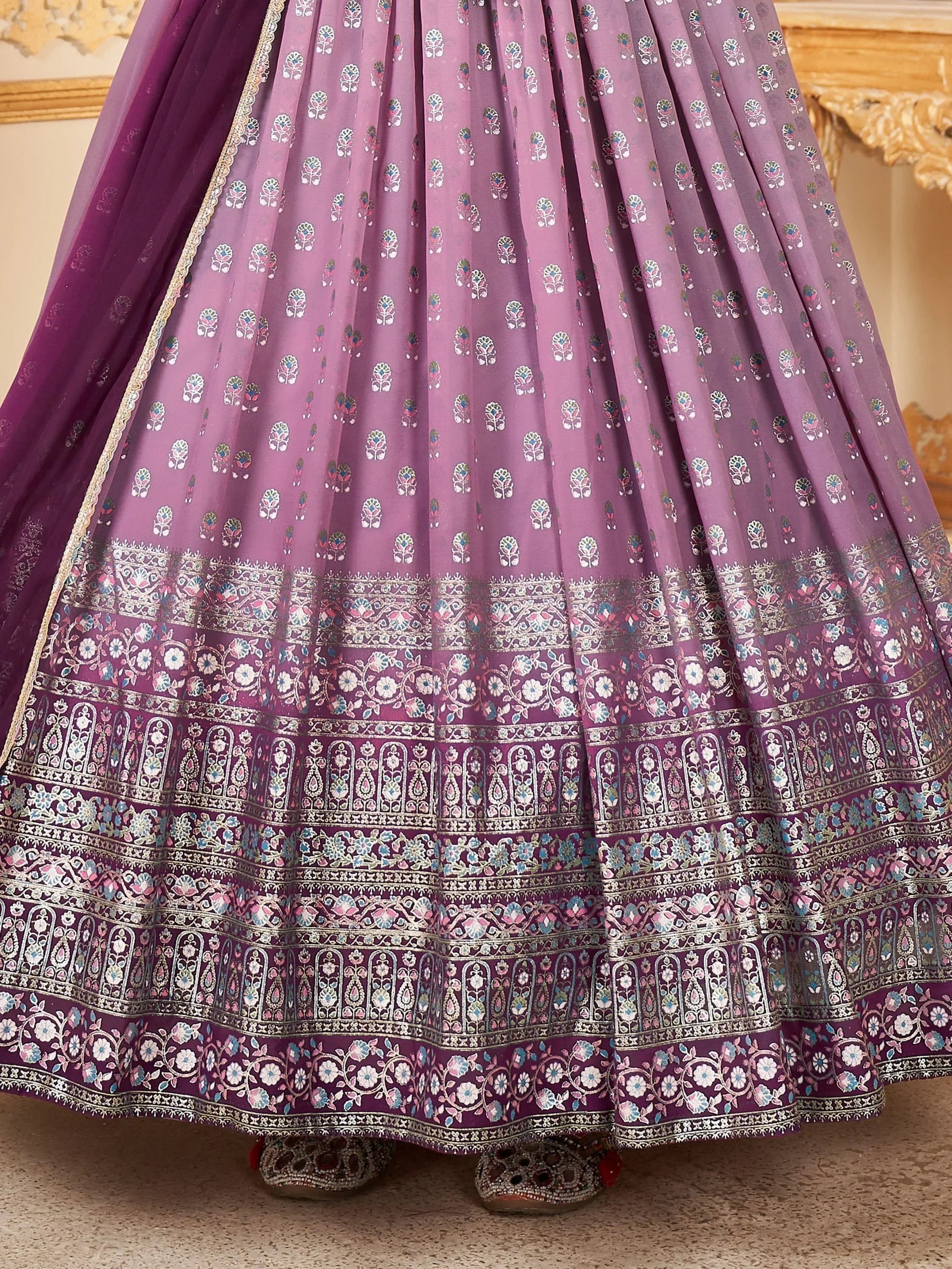 Purple lehenga with silver zari embroidery and floral patterns, traditional Indian ethnic wear