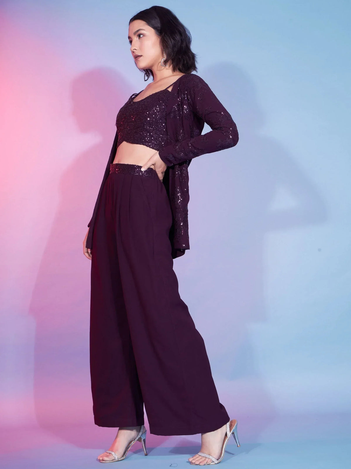 Elegant plum ethnic palazzo set with sequin crop top and jacket, perfect for festive occasions