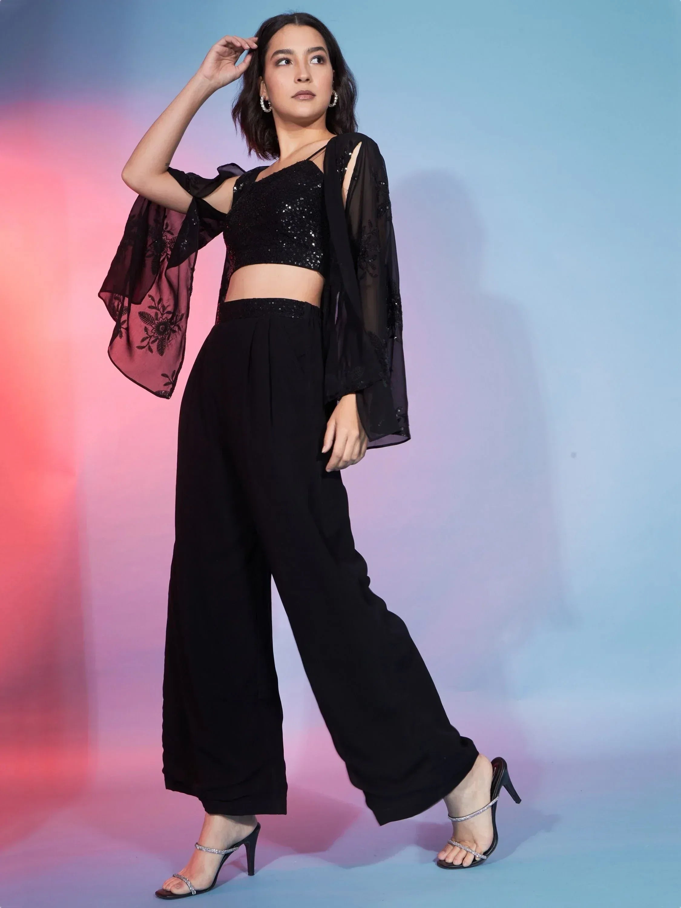 Black sequin crop top with sheer embroidered jacket and wide-leg pants, ethnic wear outfit