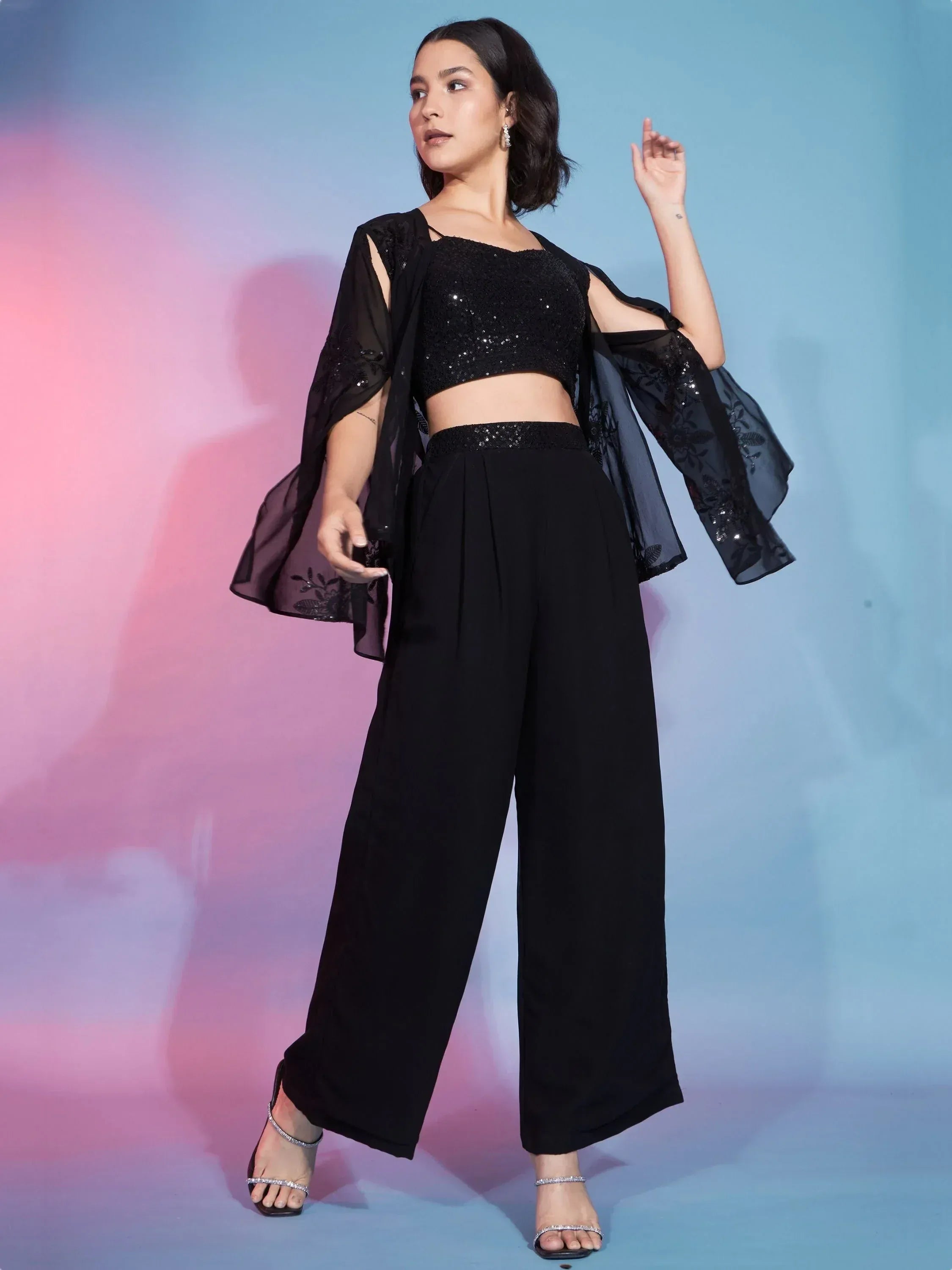 Black sequin crop top with sheer embroidered cape and wide-leg pants, ethnic party wear outfit