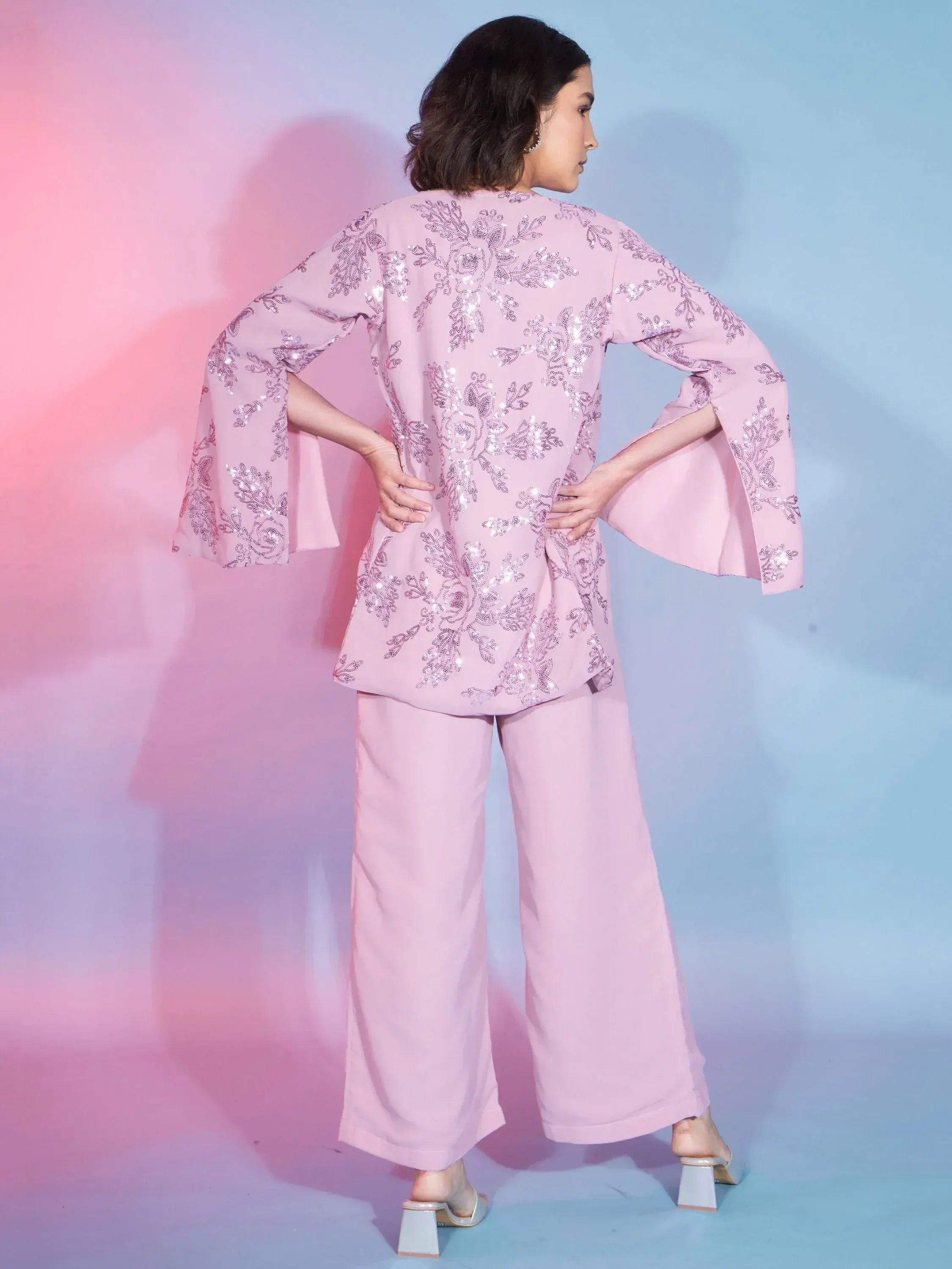 Pink sequin floral ethnic top with wide pants, back view